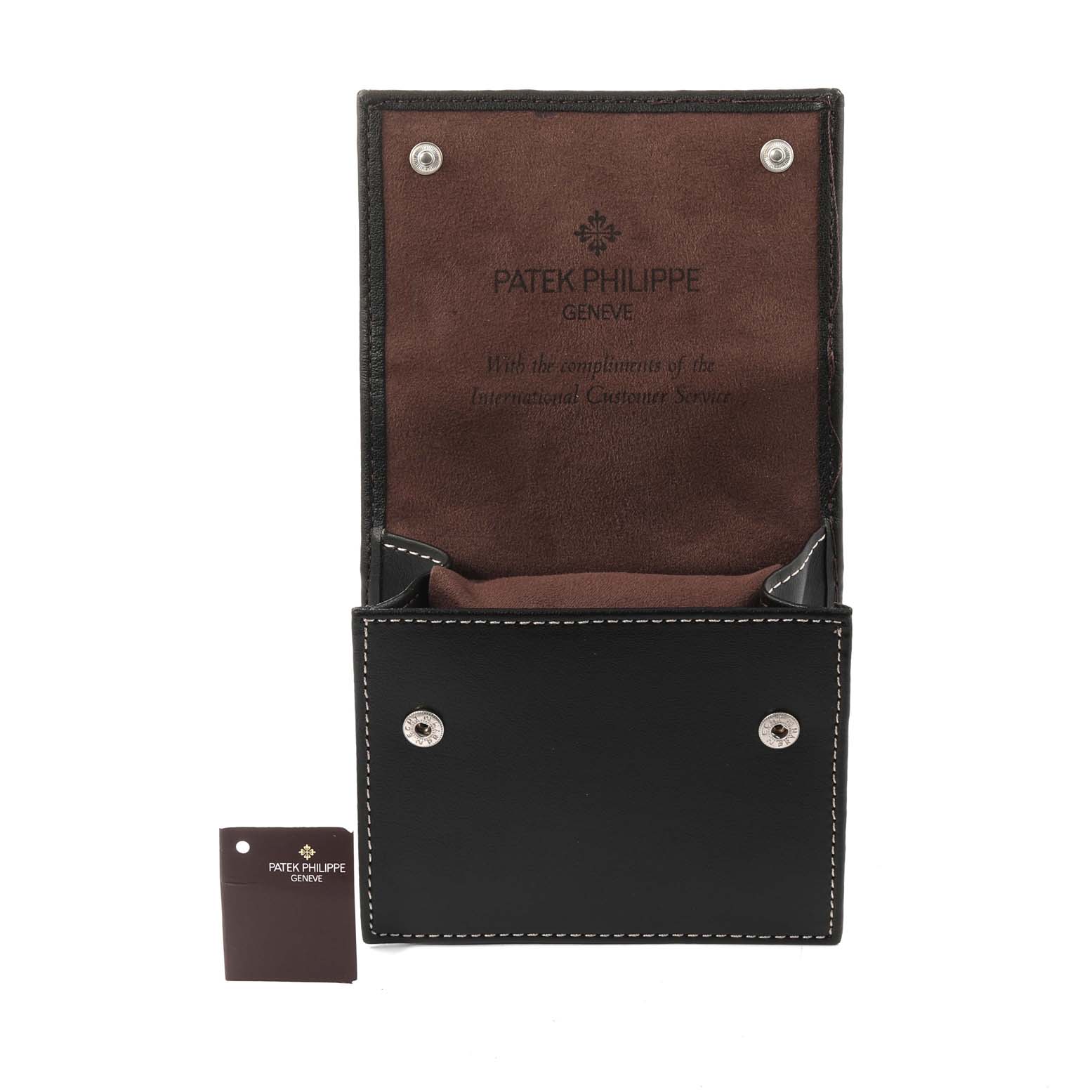 The image shows a Patek Philippe Aquanaut 5164A Men's Stainless Steel Black Dial 5164A Men's Stainless Steel Black Dial watch case, open to reveal the interior with branded text visible.