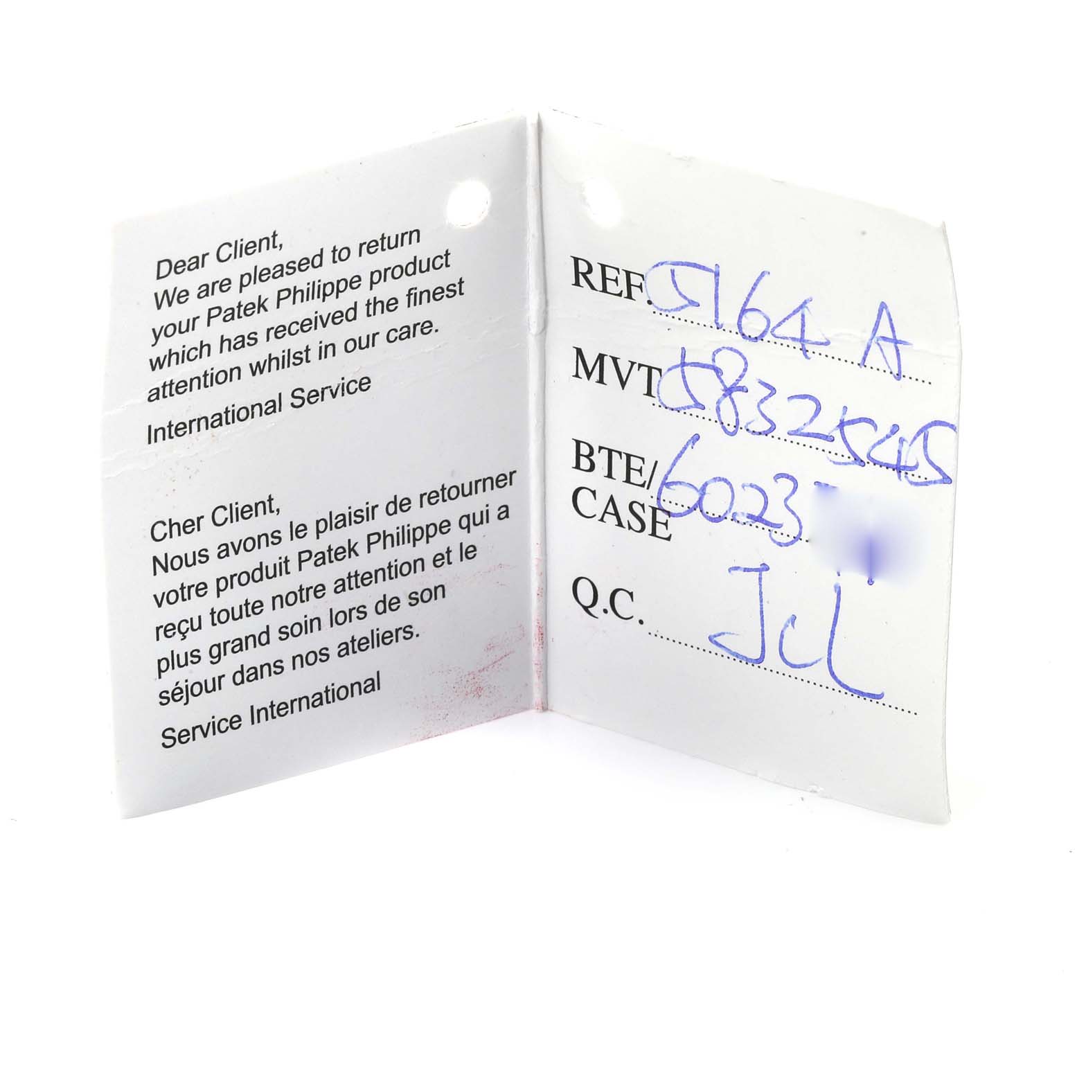 This image shows a service card for the Patek Philippe Aquanaut 5164A Men's Stainless Steel Black Dial 5164A Men's Stainless Steel Black Dial model with handwriting detailing the reference, movement, and case numbers.