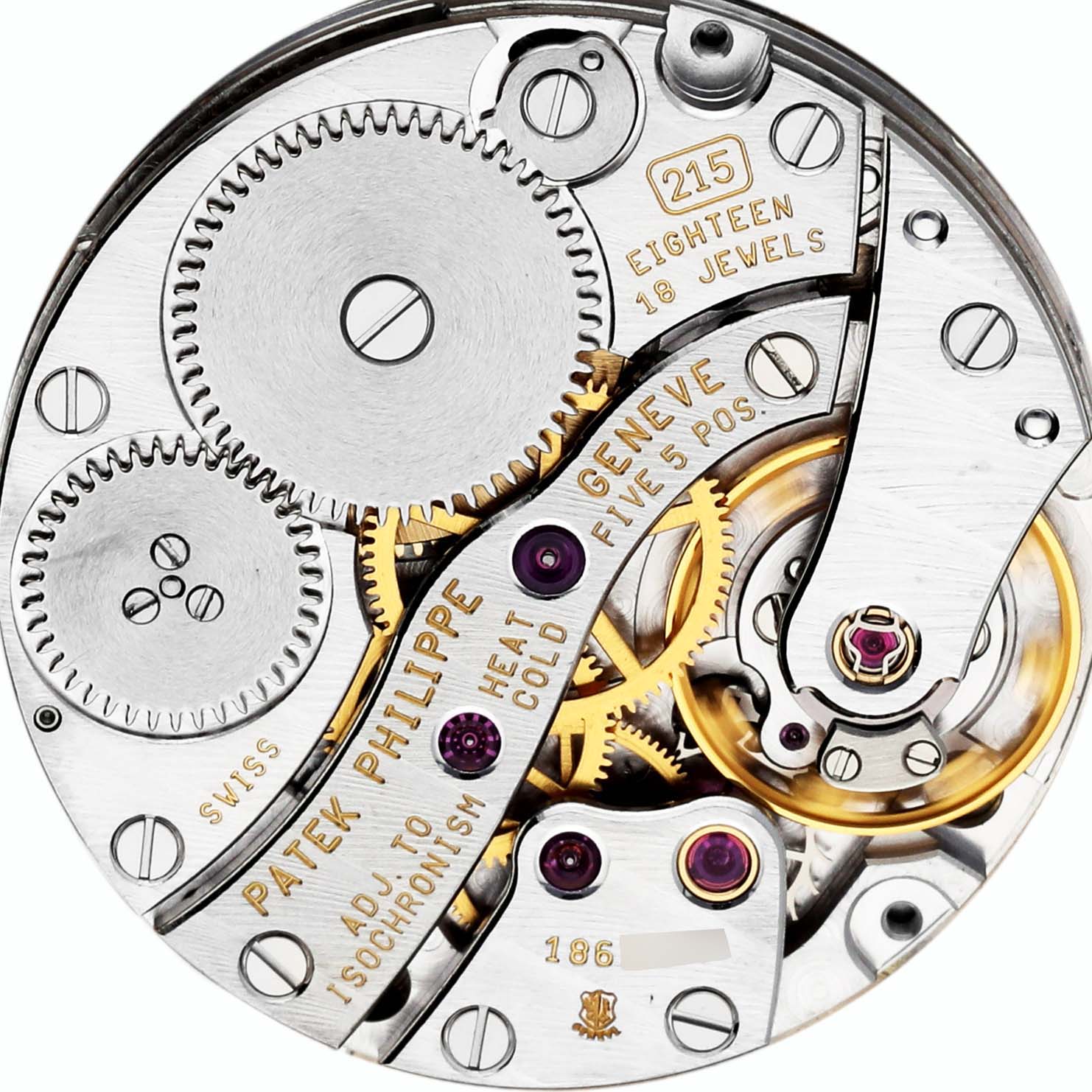 This image shows the intricate movement of a Patek Philippe Calatrava 3919J Men's Yellow Gold White Dial 3919J Men's Yellow Gold White Dial watch from a top-down angle.