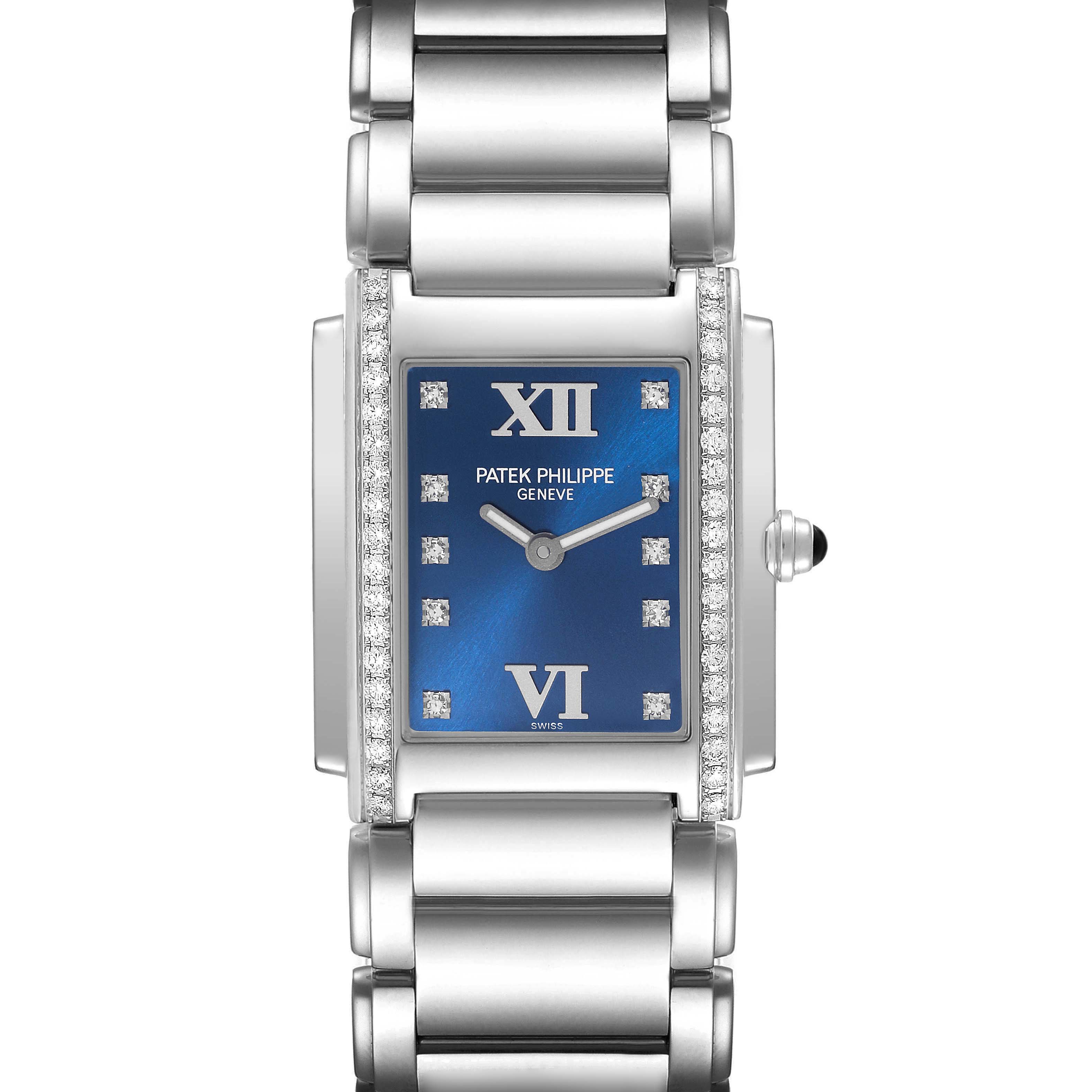 This image shows a frontal view of a Patek Philippe Twenty-4 4910/10A-012 Women's Stainless Steel Blue Dial 4910/10A-012 Women's Stainless Steel Blue Dial watch, highlighting the dial, case, bracelet, and diamonds.