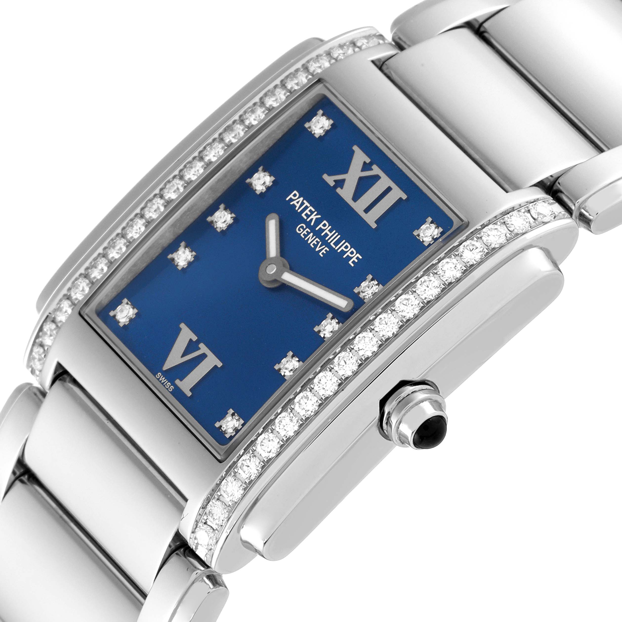 The image shows a close-up, angled view of a Patek Philippe Twenty-4 4910/10A-012 Women's Stainless Steel Blue Dial 4910/10A-012 Women's Stainless Steel Blue Dial model watch, highlighting the blue dial, diamond accents, and part of the bracelet.