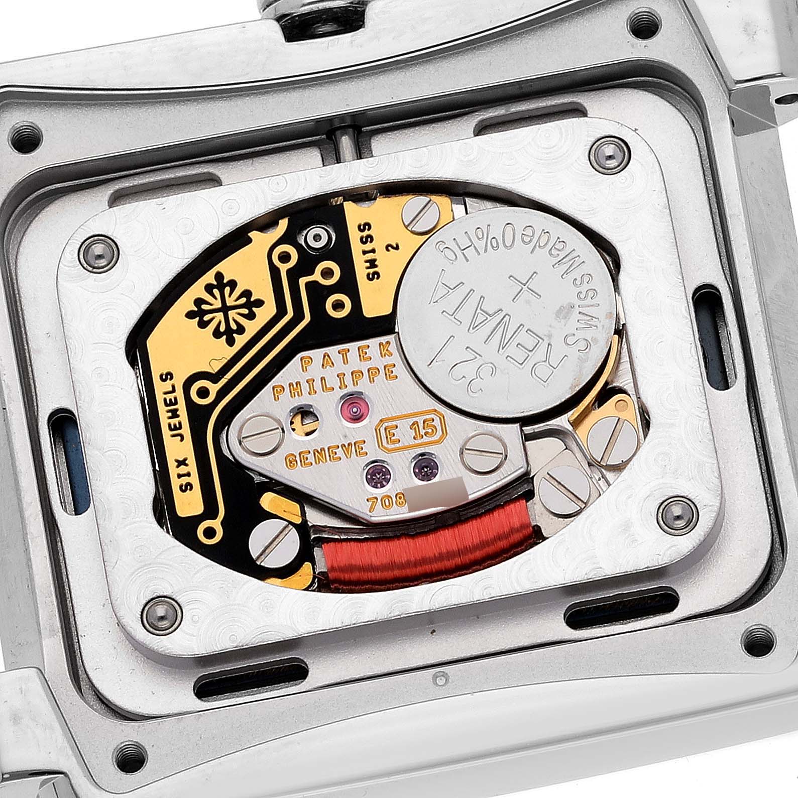 The image shows a close-up of the movement and inner mechanism of a Patek Philippe Twenty-4 4910/10A-012 Women's Stainless Steel Blue Dial 4910/10A-012 Women's Stainless Steel Blue Dial model watch from the back.