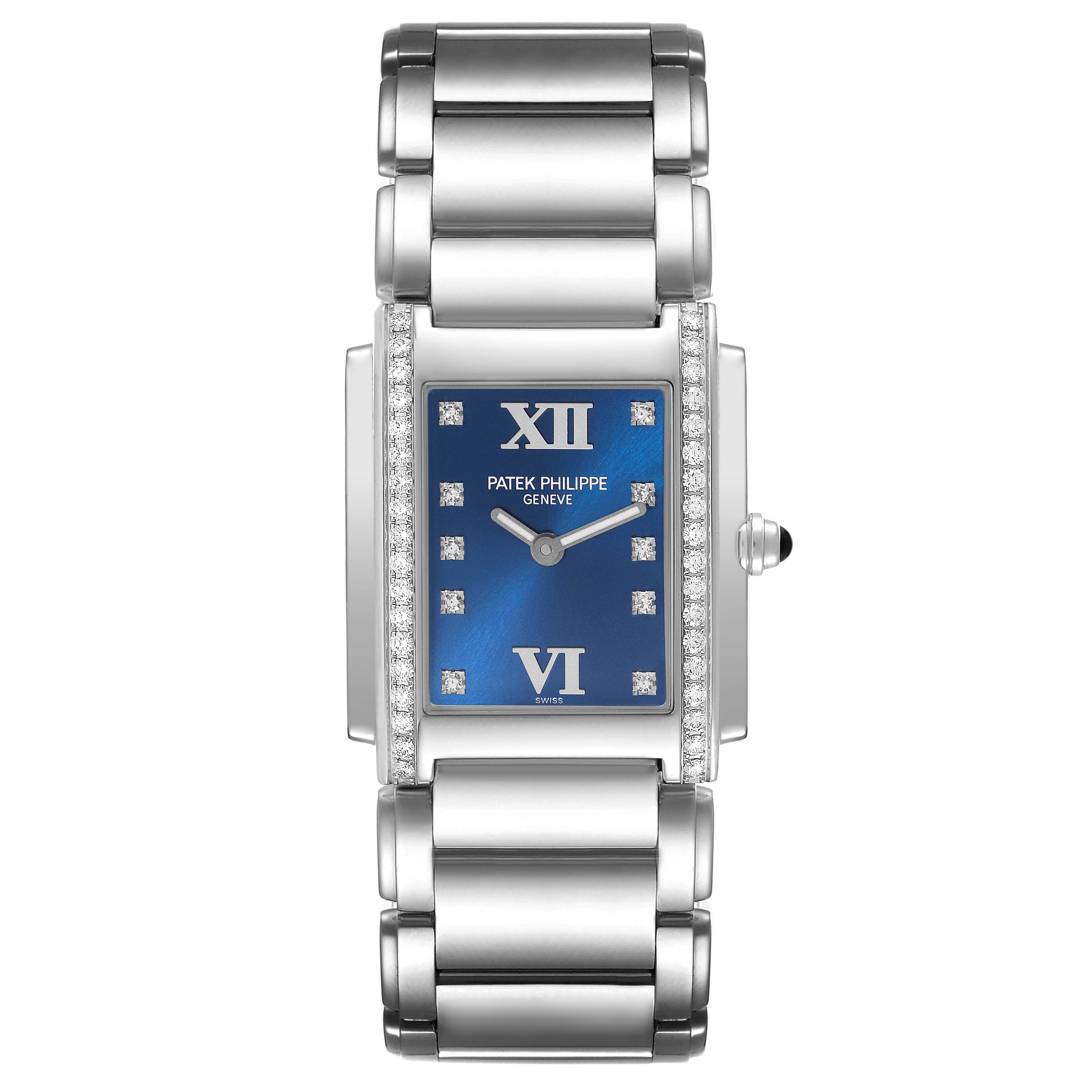 This image shows a front view of a Patek Philippe Twenty-4 4910/10A-012 Women's Stainless Steel Blue Dial 4910/10A-012 Women's Stainless Steel Blue Dial watch, highlighting its blue dial, Roman numerals, and diamond-accented bezel.