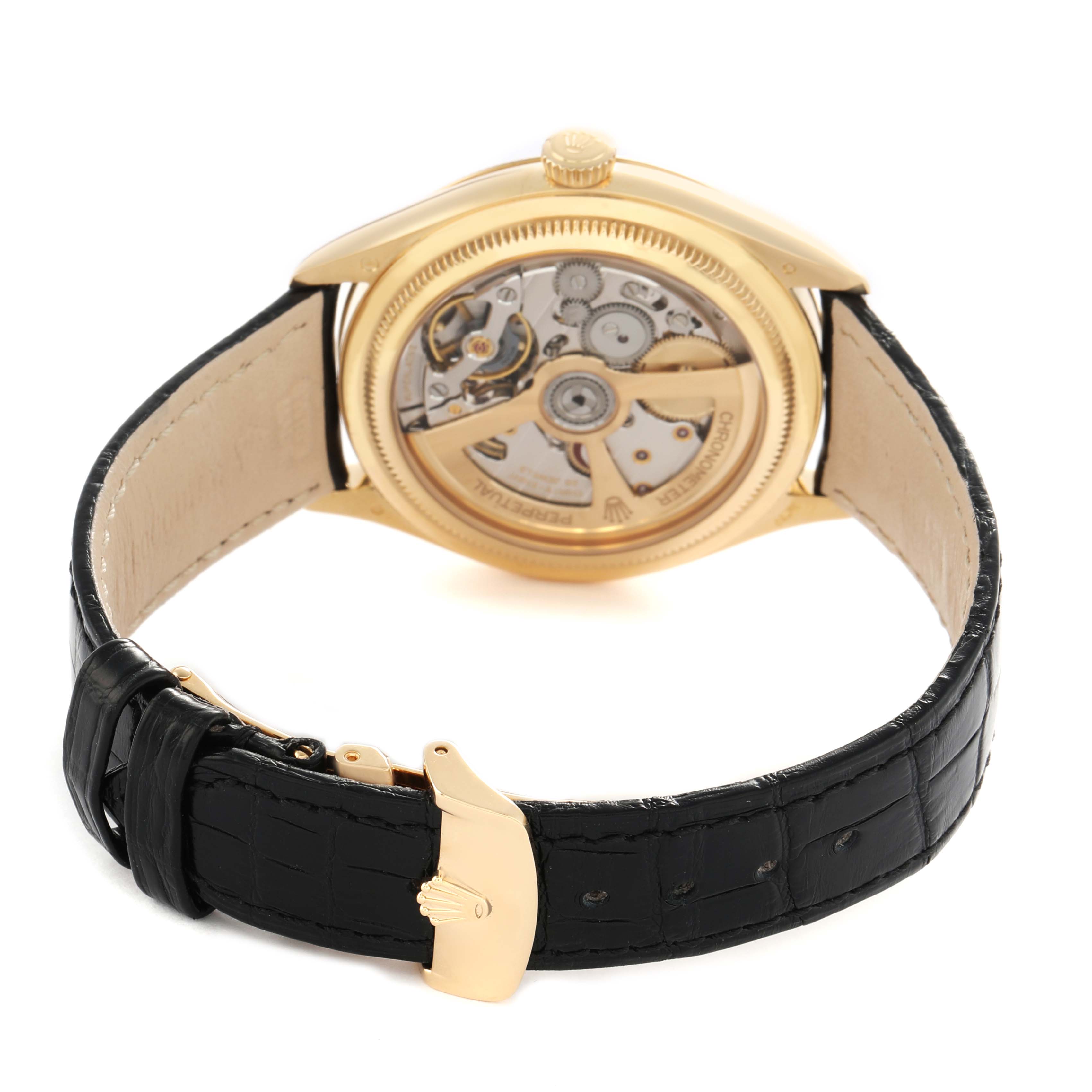 The image shows the back view of a Rolex 1908 52508 Men's Yellow Gold Black Dial model, highlighting its movement and black leather strap.