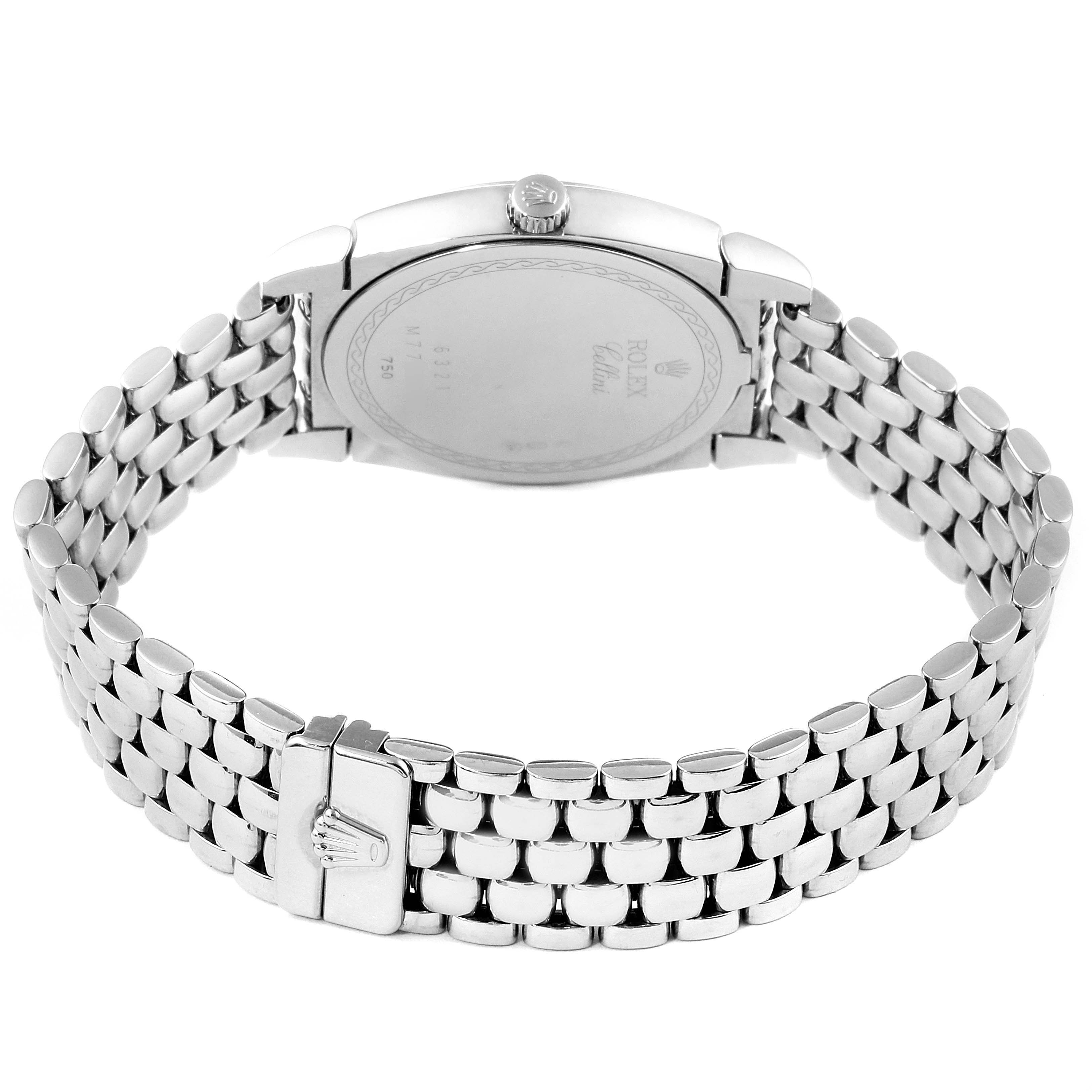 The Rolex Cellini 6321 Women's White Gold Mother of Pearl Dial 6321 Women's White Gold Mother of Pearl Dial watch is shown from the back, highlighting the case back and the metal bracelet with a clasp.