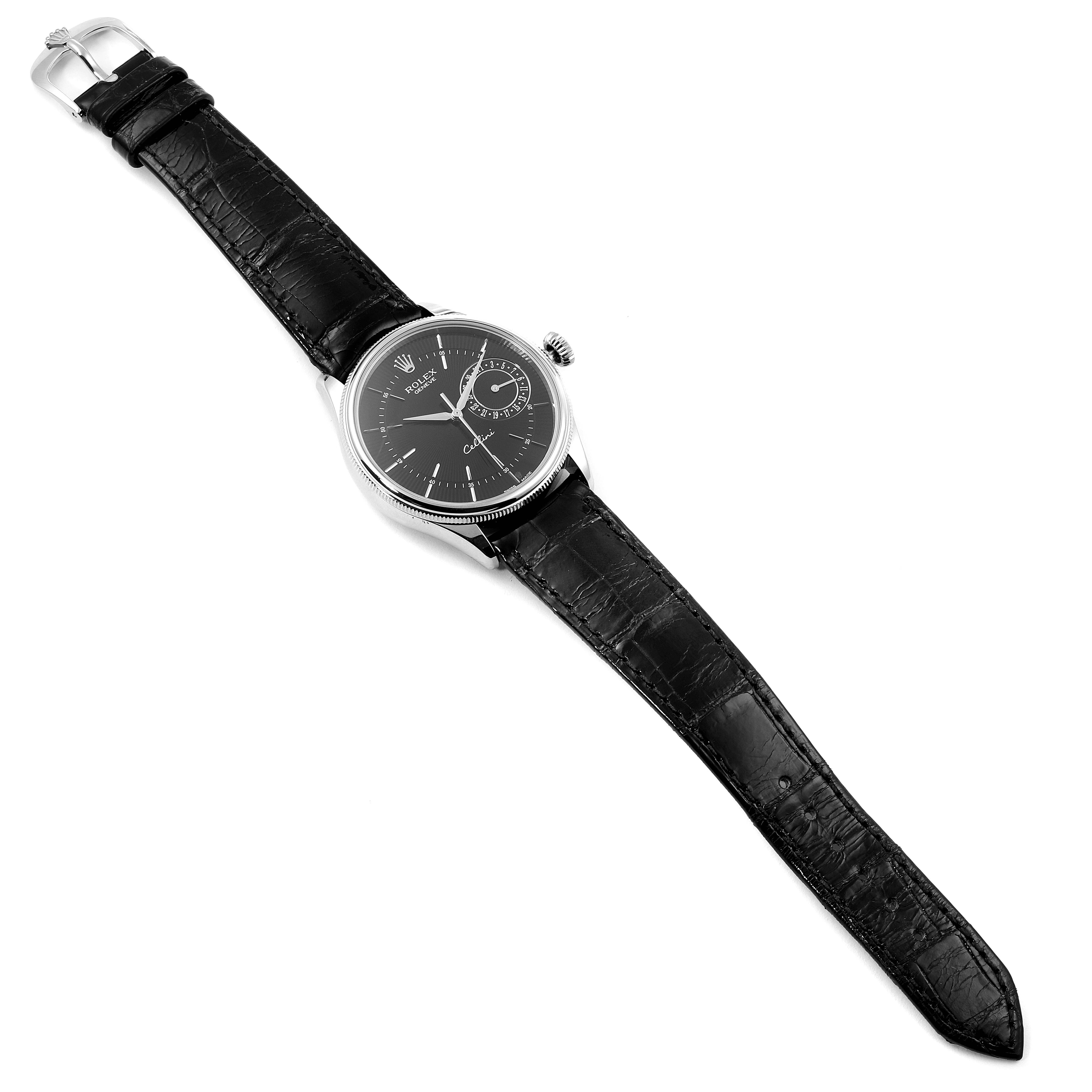 The Rolex Cellini 50519 Men's White Gold Black Dial 50519 Men's White Gold Black Dial watch is shown from a top-down angle, displaying the black leather strap, case, dial, and hands.