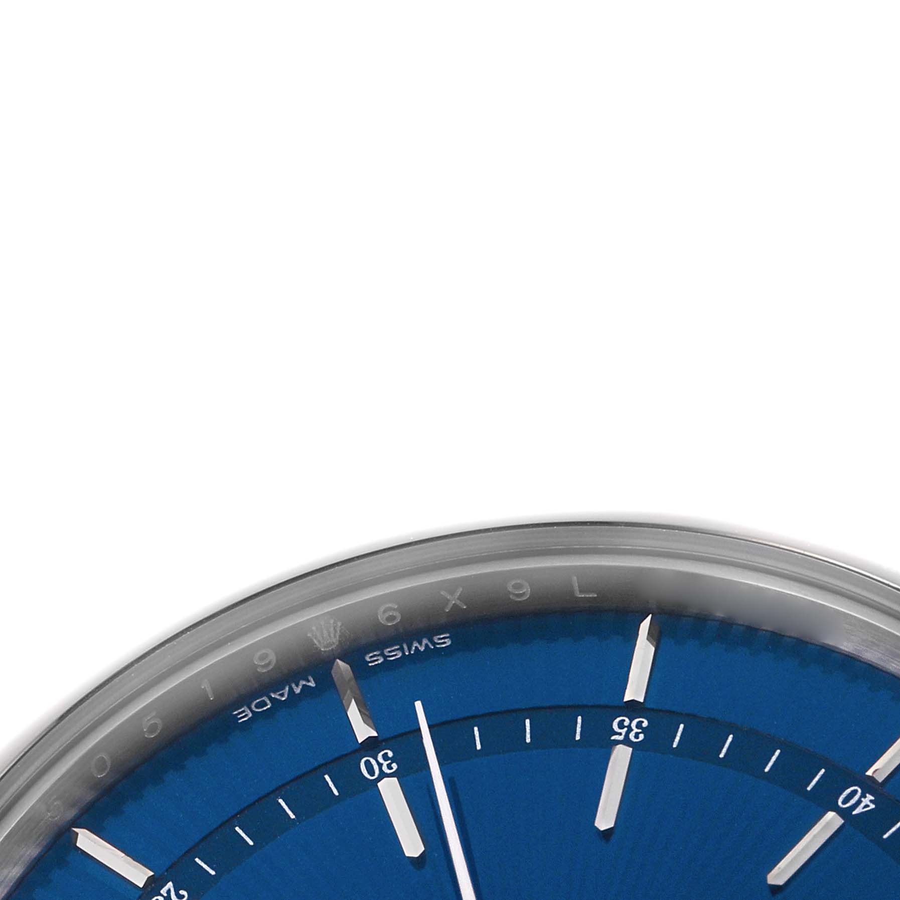 This image shows a close-up of the Rolex Cellini 50519 Men's White Gold Blue Dial watch, highlighting the blue dial, indices, and partial bezel.