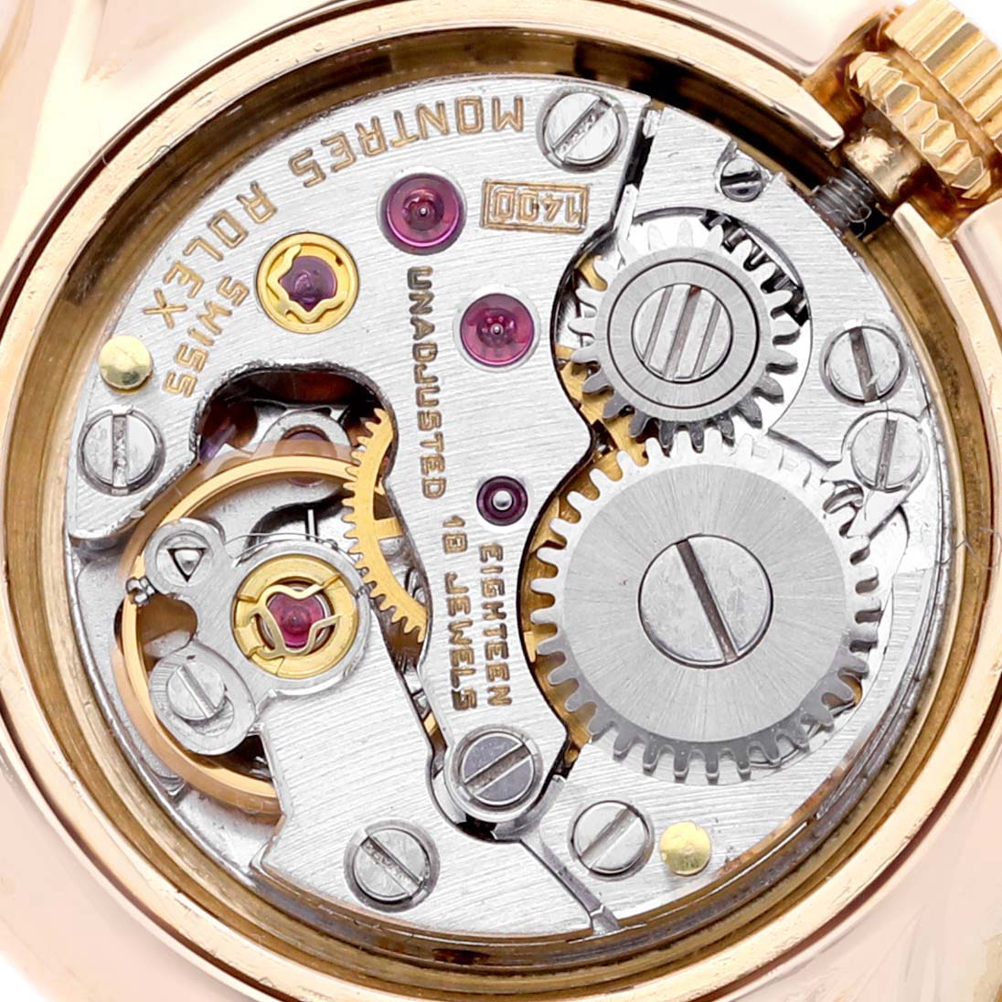 The image shows a close-up of the movement parts of a Rolex Cellini 2035 Women
s Yellow Gold Mother of Pearl Dial 2035 Women
s Yellow Gold Mother of Pearl Dial watch from a top-down angle.