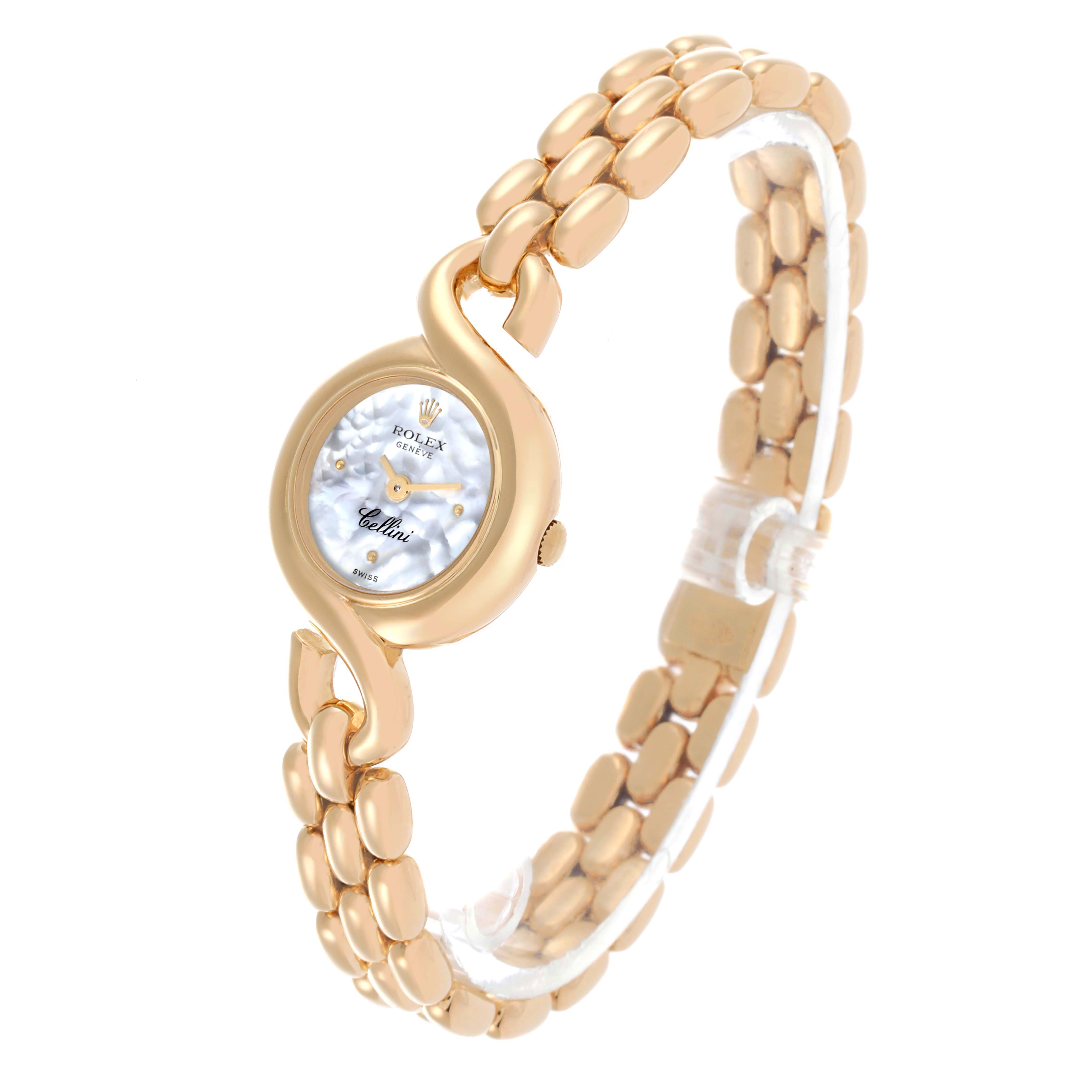 The Rolex Cellini 2035 Women
s Yellow Gold Mother of Pearl Dial 2035 Women
s Yellow Gold Mother of Pearl Dial watch is shown at a side angle, displaying the face, bezel, crown, and bracelet.
