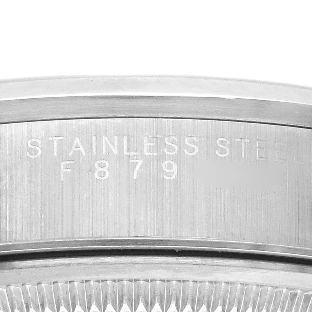 The image shows the side view of a Rolex Date 15200 Men's Stainless Steel Silver Dial 15200 Men's Stainless Steel Silver Dial's case, highlighting engravings on the stainless steel surface.