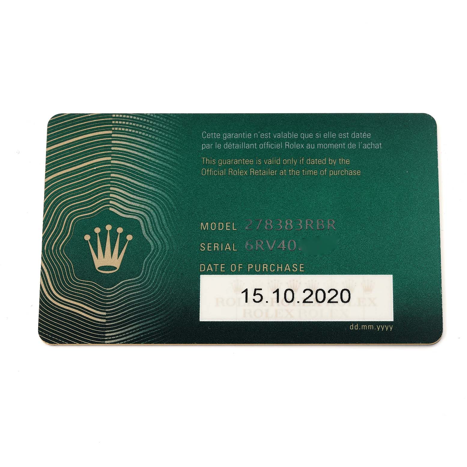 This image shows a Rolex guarantee card for the mid-size model, providing model, serial numbers, and purchase date.