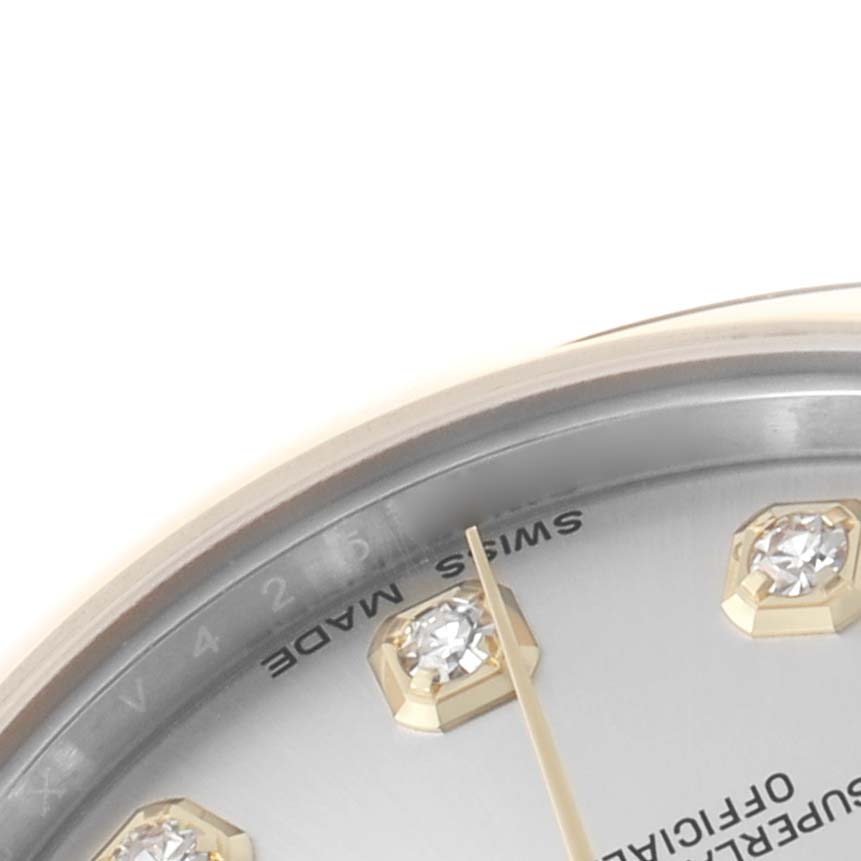 The image shows a close-up of the dial edge of a Rolex Mid-Size 178243 Women's Steel and Gold (two tone) Silver Dial watch featuring diamond hour markers.