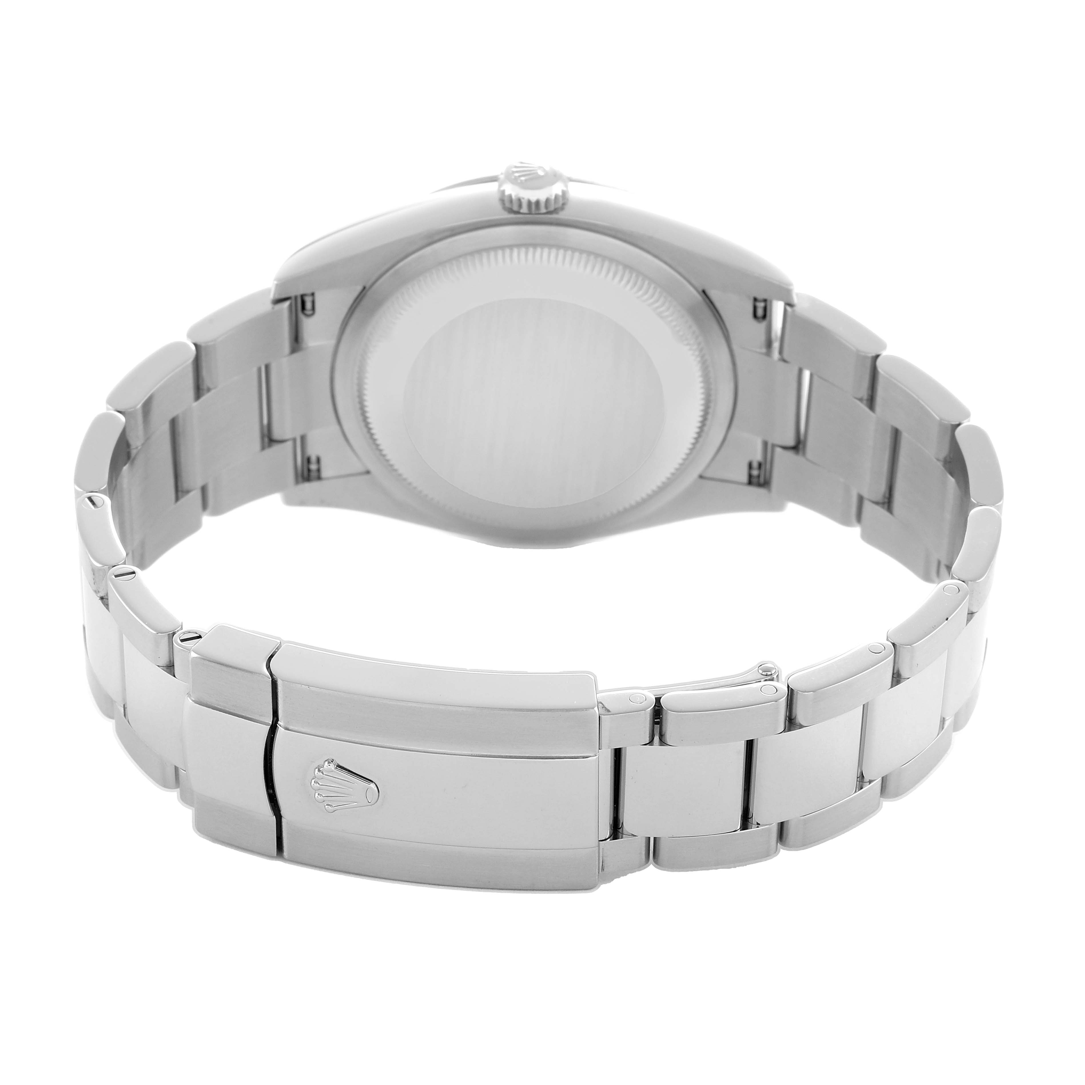 The image shows the back view of a Rolex Datejust 126200 Men's Stainless Steel Blue Dial watch highlighting the case back and bracelet clasp.