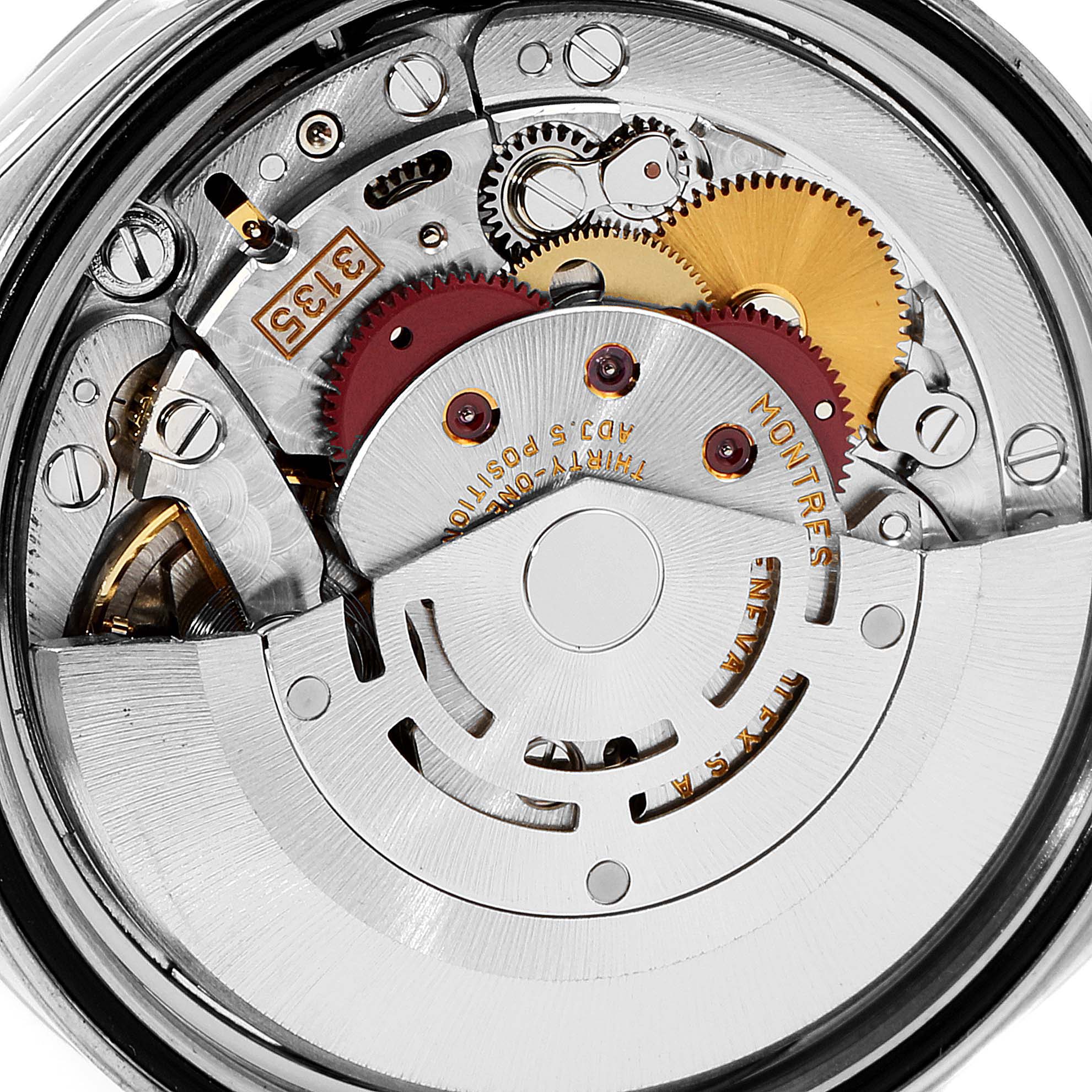 This image shows the intricate inner mechanism of a Rolex Datejust 16234 Men's Stainless Steel Black Dial 16234 Men's Stainless Steel Black Dial watch, focusing on its gears and movement components.