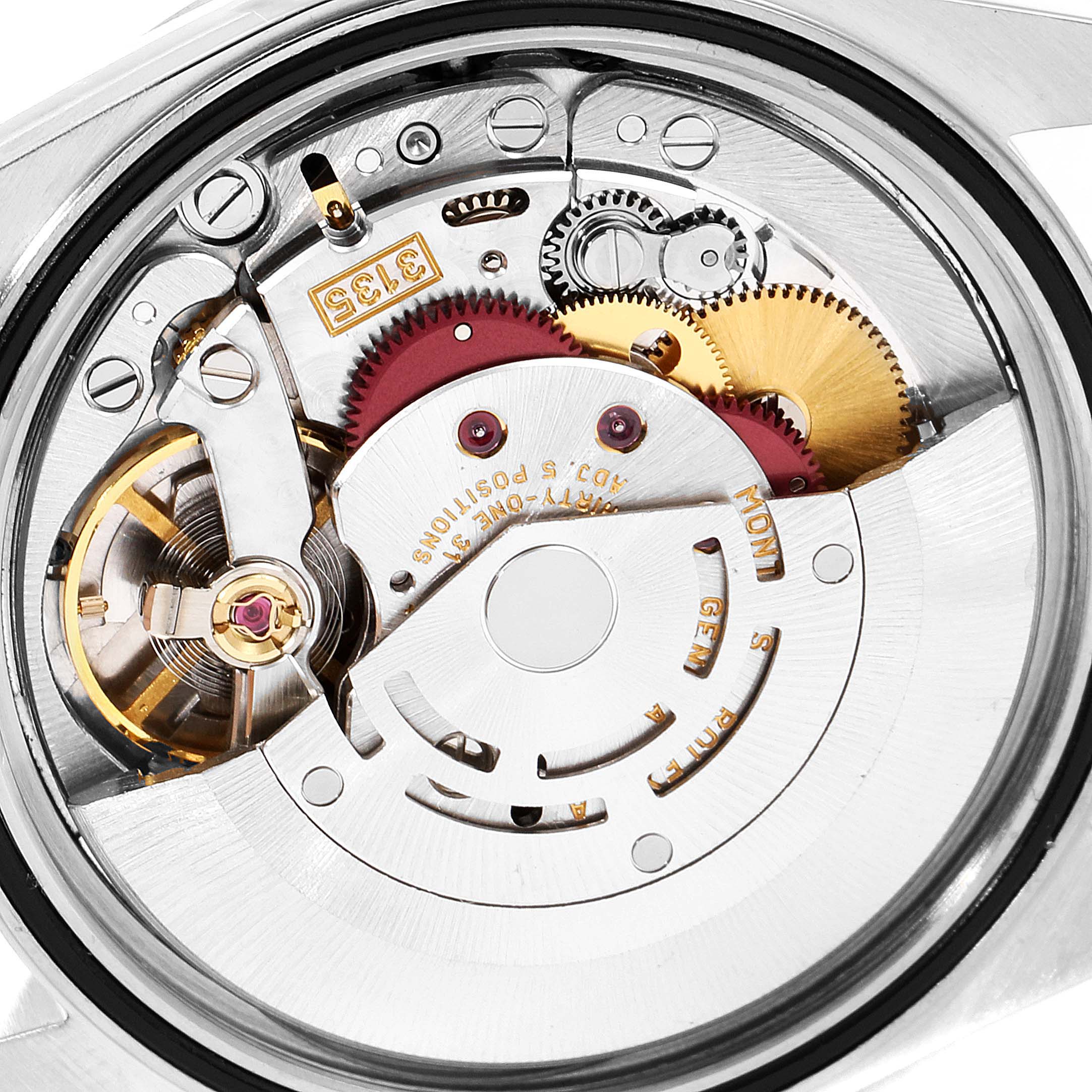 This image shows the intricate movement mechanism of a Rolex Datejust 16234 Men's Stainless Steel White Dial 16234 Men's Stainless Steel White Dial watch from an interior angle.