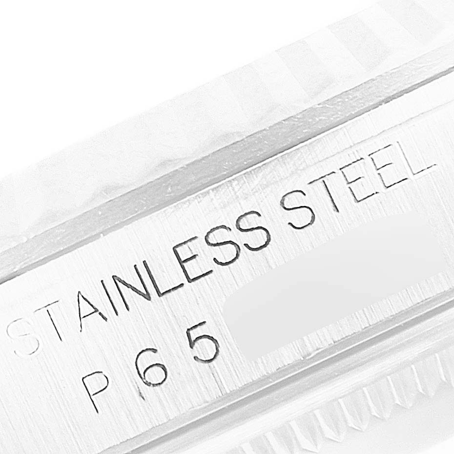 The image shows a close-up of the side of the stainless steel casing of a Rolex Datejust 16234 Men's Stainless Steel White Dial 16234 Men's Stainless Steel White Dial watch.