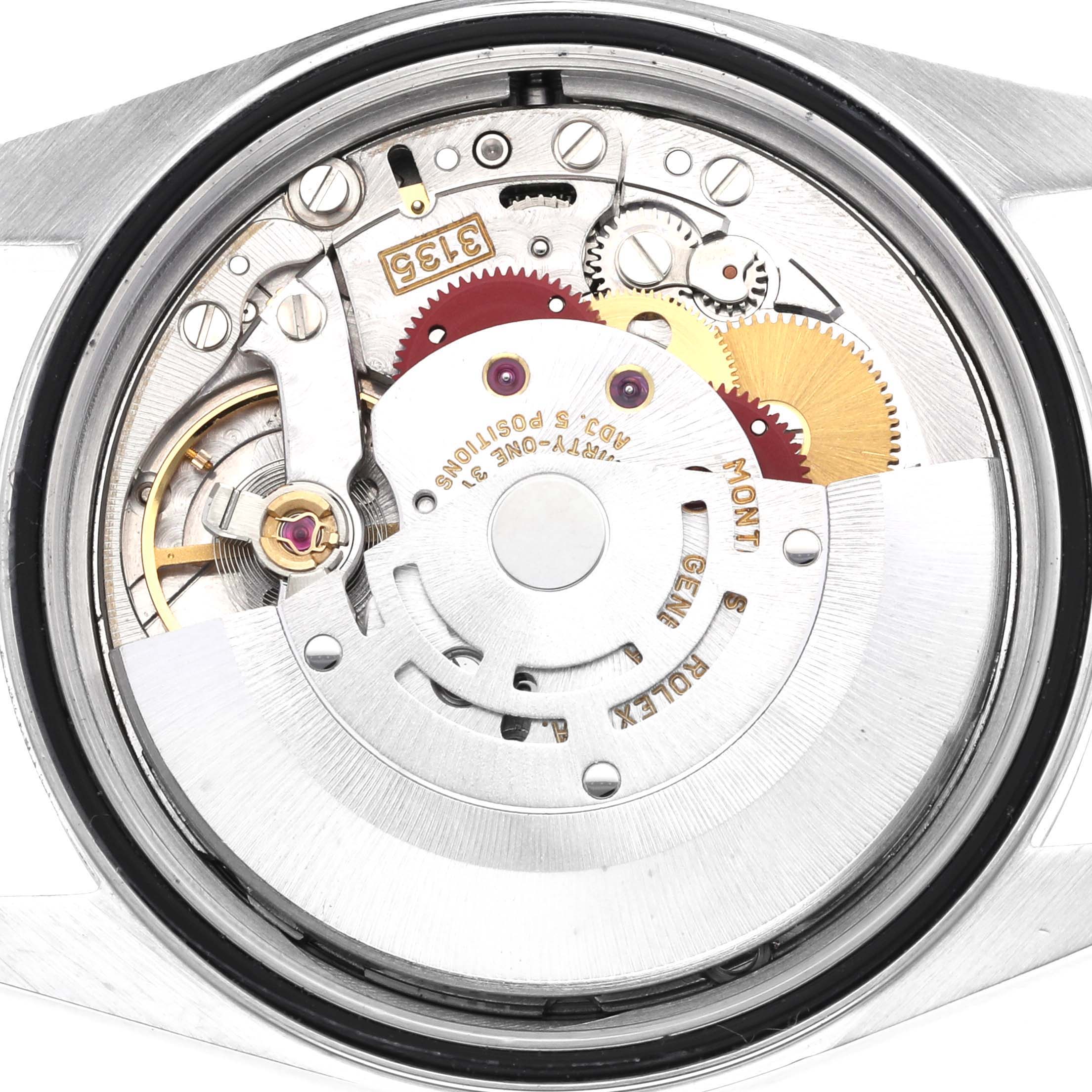 The image shows the back view of the Rolex Datejust 16234 Men
s Stainless Steel Silver Dial 16234 Men
s Stainless Steel Silver Dial watch, highlighting its movement and internal components.