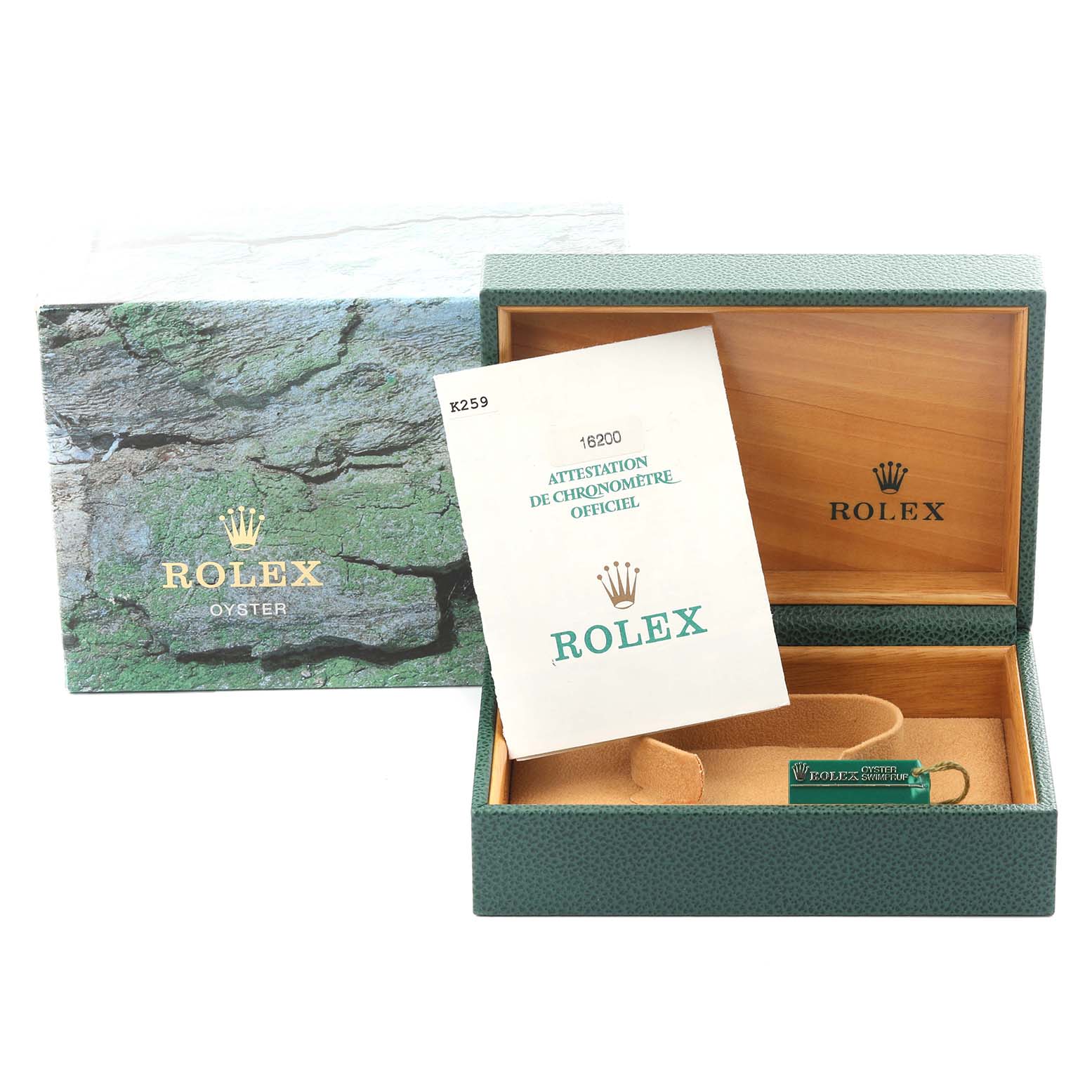 The image shows a Rolex Datejust 16200 Men's Stainless Steel White Dial 16200 Men's Stainless Steel White Dial watch box, booklet, and tag from a top angle.