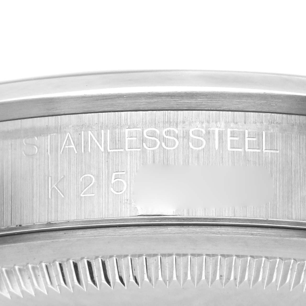 The image shows the engraved side of a Rolex Datejust 16200 Men's Stainless Steel White Dial 16200 Men's Stainless Steel White Dial watch in stainless steel.