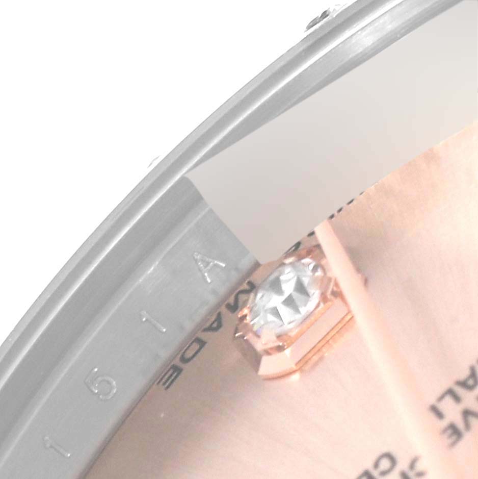 The image shows a close-up of the dial and case of a Rolex Mid-Size 178341 Women's Steel and Gold (two tone) Pink Dial 178341 Women's Steel and Gold (two tone) Pink Dial model, highlighting a diamond hour marker and partial serial number.