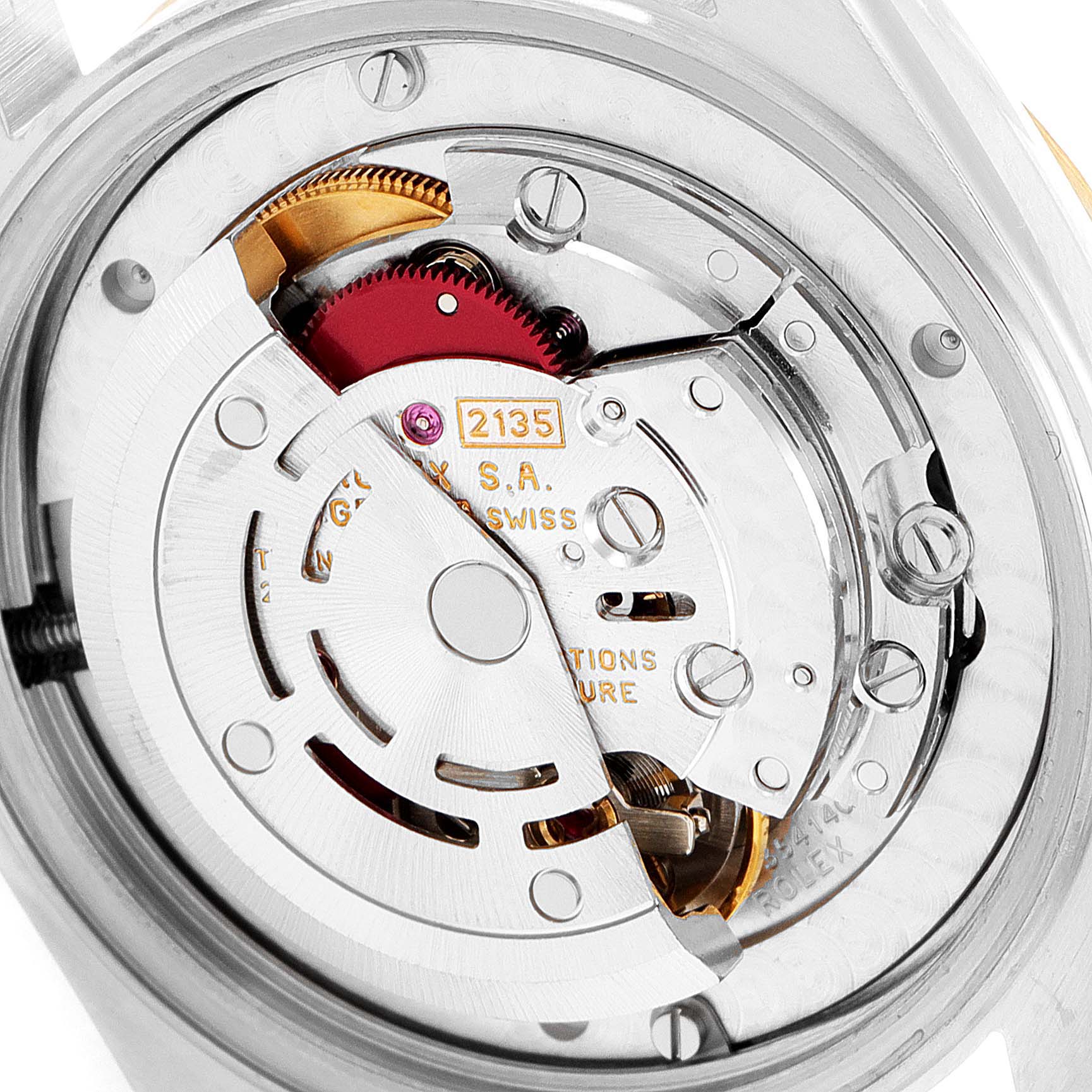 This image shows a close-up of the movement and inner mechanisms of a Rolex Mid-Size 68273 Women's Steel and Gold (two tone) Mother of Pearl Dial 68273 Women's Steel and Gold (two tone) Mother of Pearl Dial model watch.