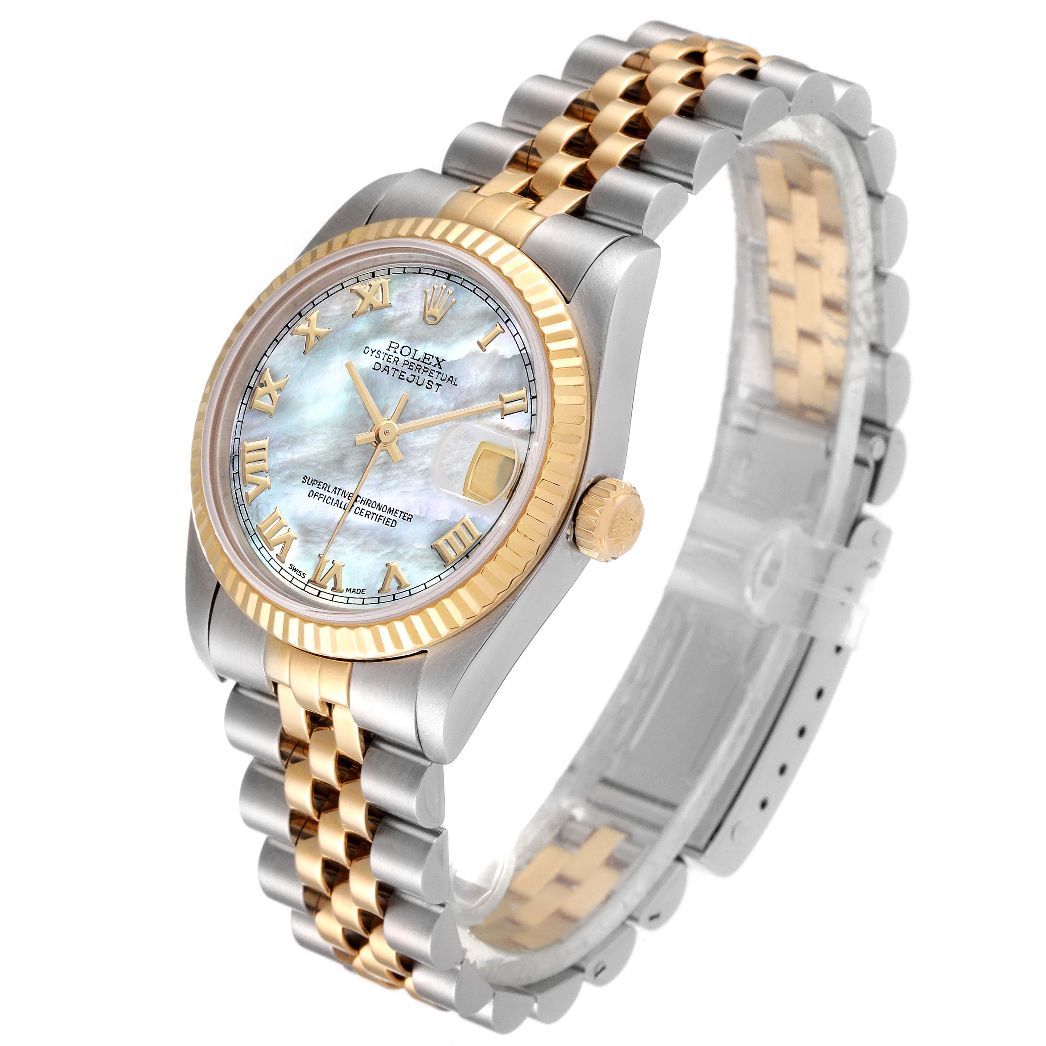 The image shows a Rolex Mid-Size 68273 Women's Steel and Gold (two tone) Mother of Pearl Dial 68273 Women's Steel and Gold (two tone) Mother of Pearl Dial watch from an angled top view, highlighting its two-tone bezel, bracelet, and dial with Roman numerals.