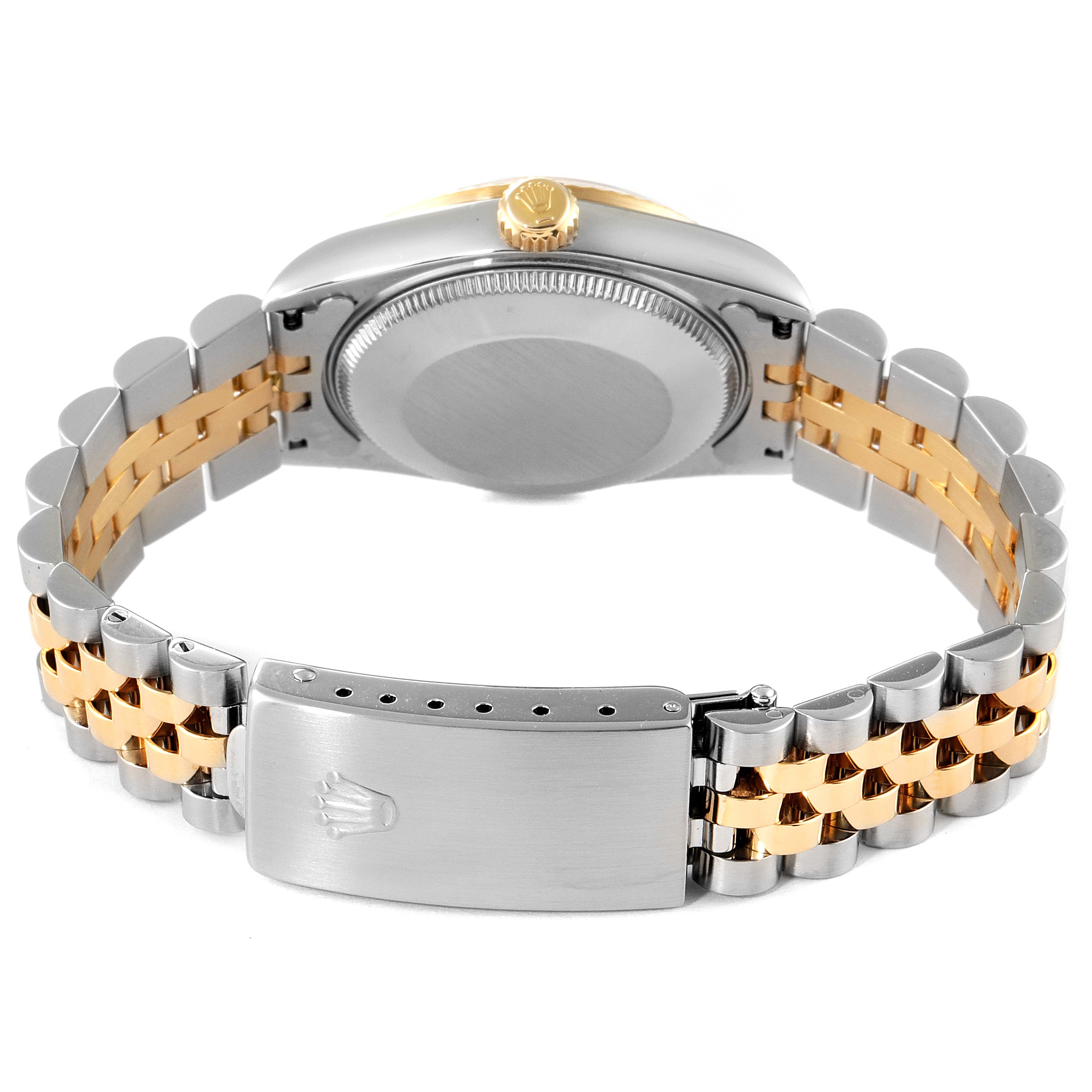 The image shows the back and clasp of a Rolex Mid-Size 68273 Women's Steel and Gold (two tone) Mother of Pearl Dial 68273 Women's Steel and Gold (two tone) Mother of Pearl Dial model watch with a two-tone metal bracelet.