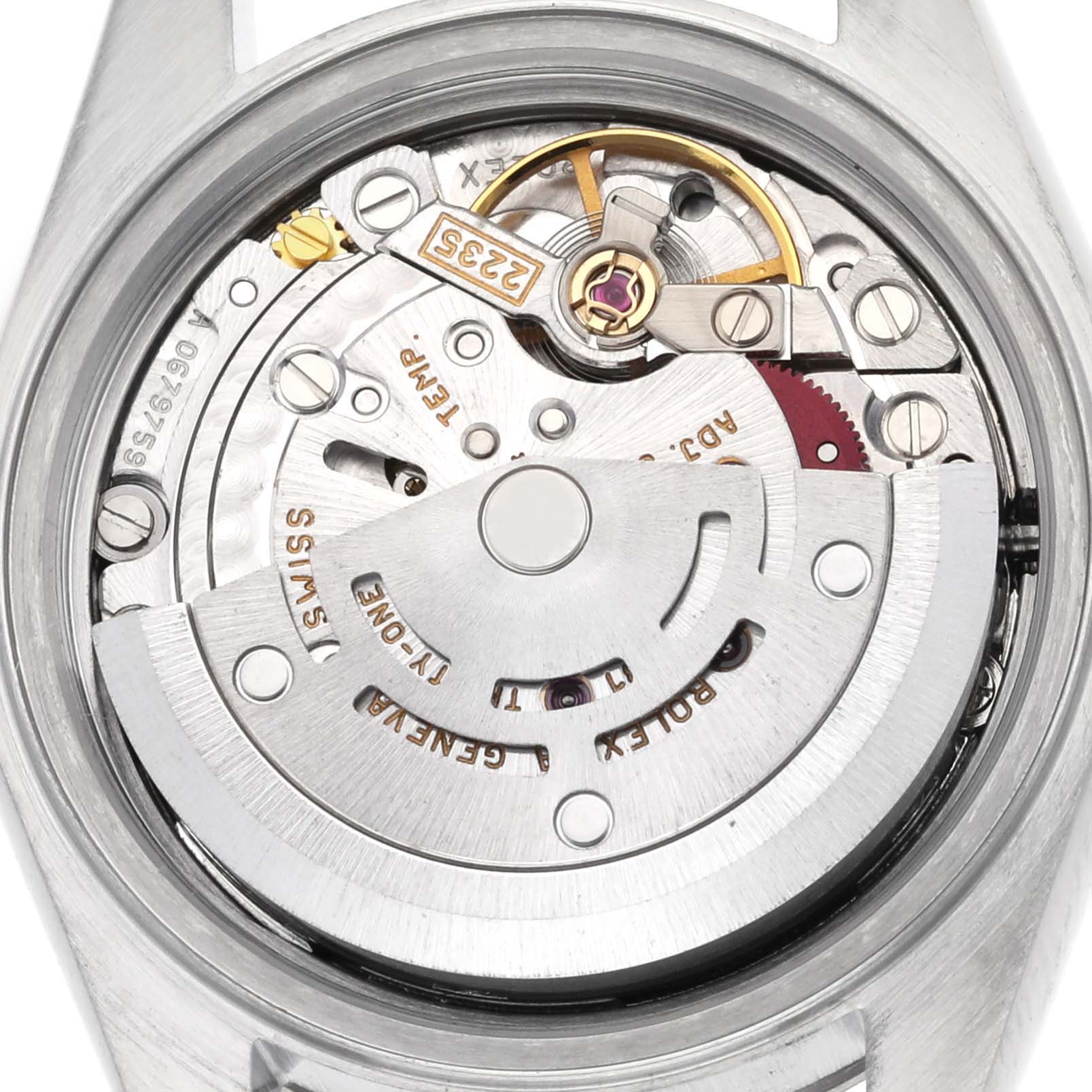 The image shows the movement mechanism of a Rolex Datejust 79174 Women's Stainless Steel Pink Dial 79174 Women's Stainless Steel Pink Dial watch from a rear angle, highlighting the rotor and gears.