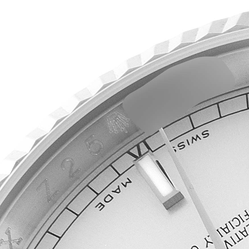 The image shows a close-up of the dial and bezel of a Rolex Datejust 116234 Men's Stainless Steel Silver Dial 116234 Men's Stainless Steel Silver Dial watch, featuring the "Swiss Made" text and part of the fluted bezel.