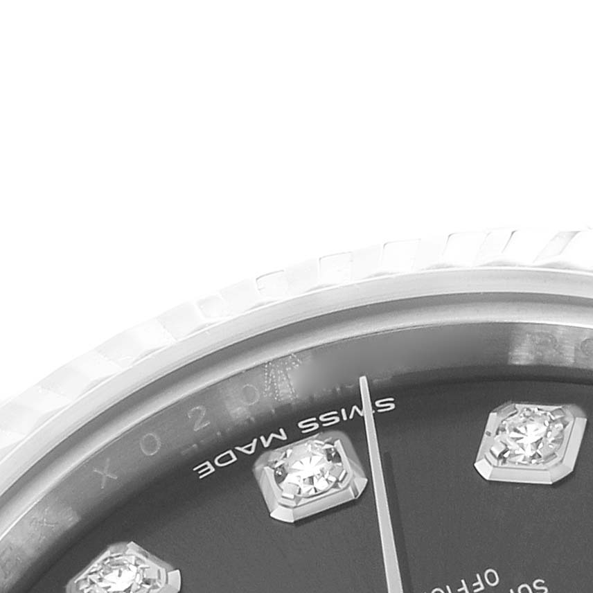 The image shows a close-up of the dial and bezel of a Rolex Datejust 279174 Women's Stainless Steel Grey Dial, focusing on diamond hour markers and part of the minute hand.