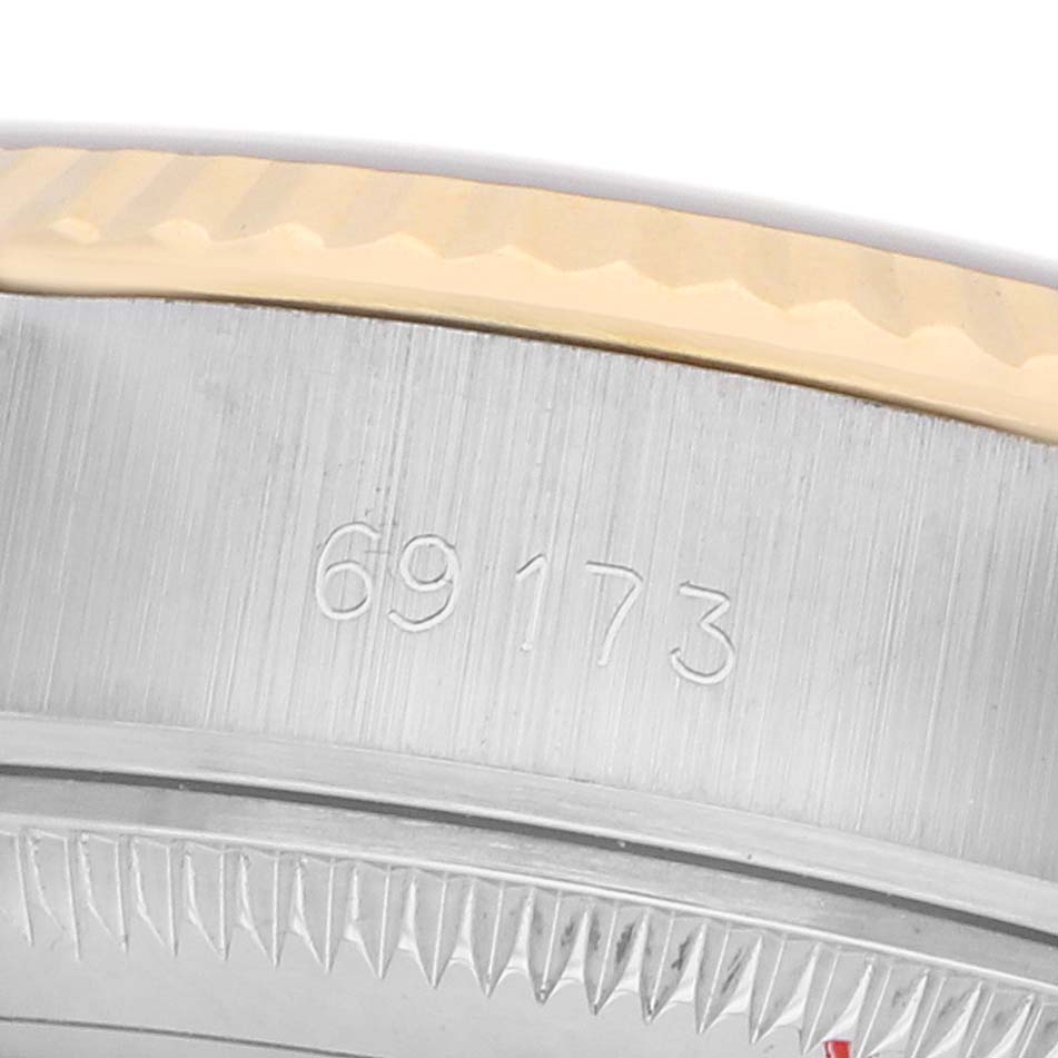 The image shows a close-up of the side and bezel of a Rolex Datejust 69173 Women's Steel and Gold (two tone) Silver Dial, highlighting the model number.
