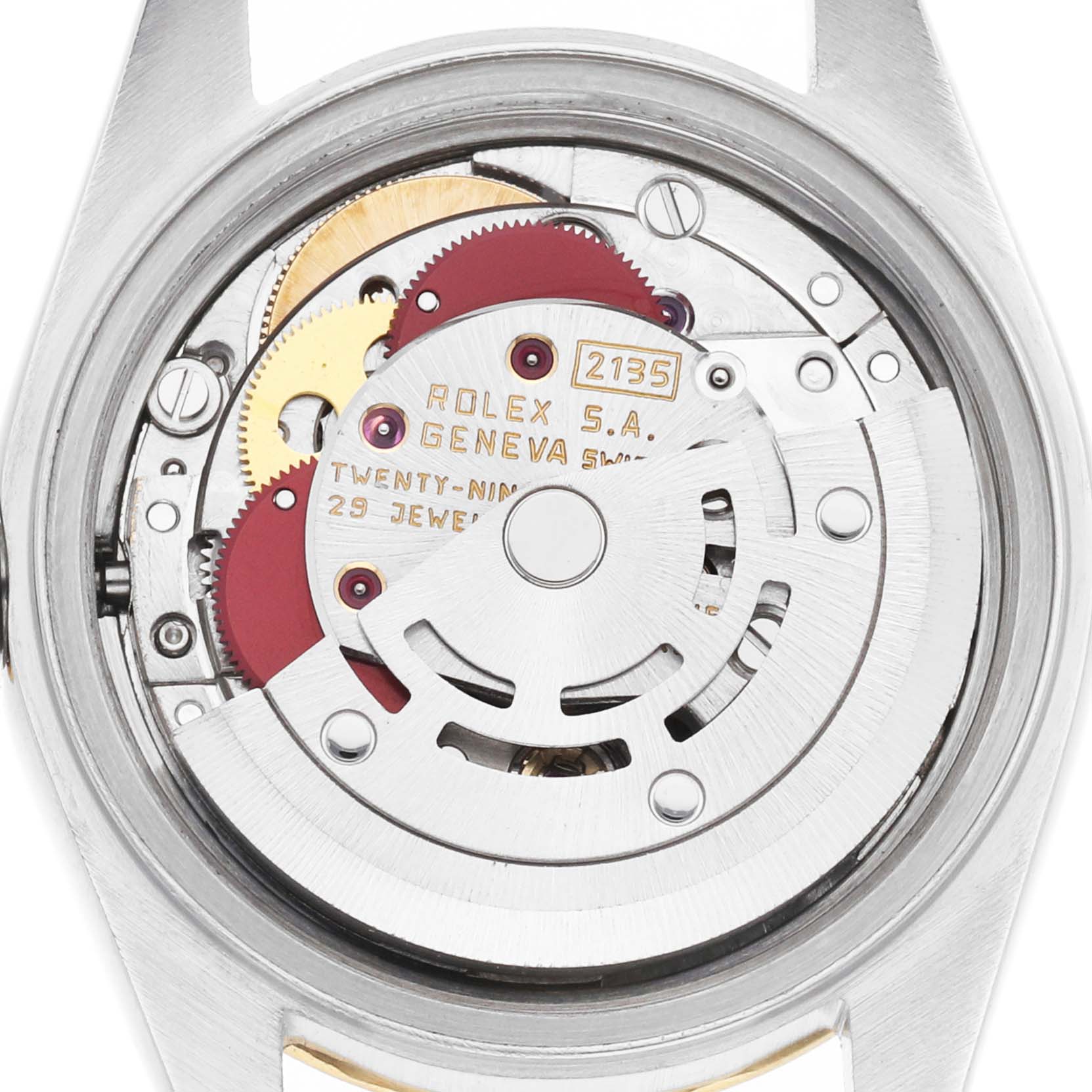The image shows the inner mechanism of a Rolex Datejust 69173 Women's Steel and Gold (two tone) Silver Dial watch viewed from the back, highlighting its movement components.