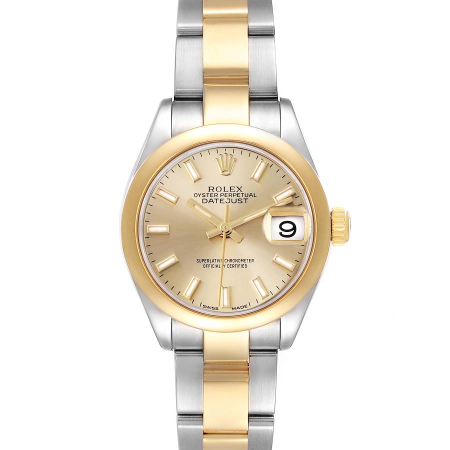 The Rolex Datejust watch is shown from a top-down angle, featuring its gold and silver-toned bracelet and dial.