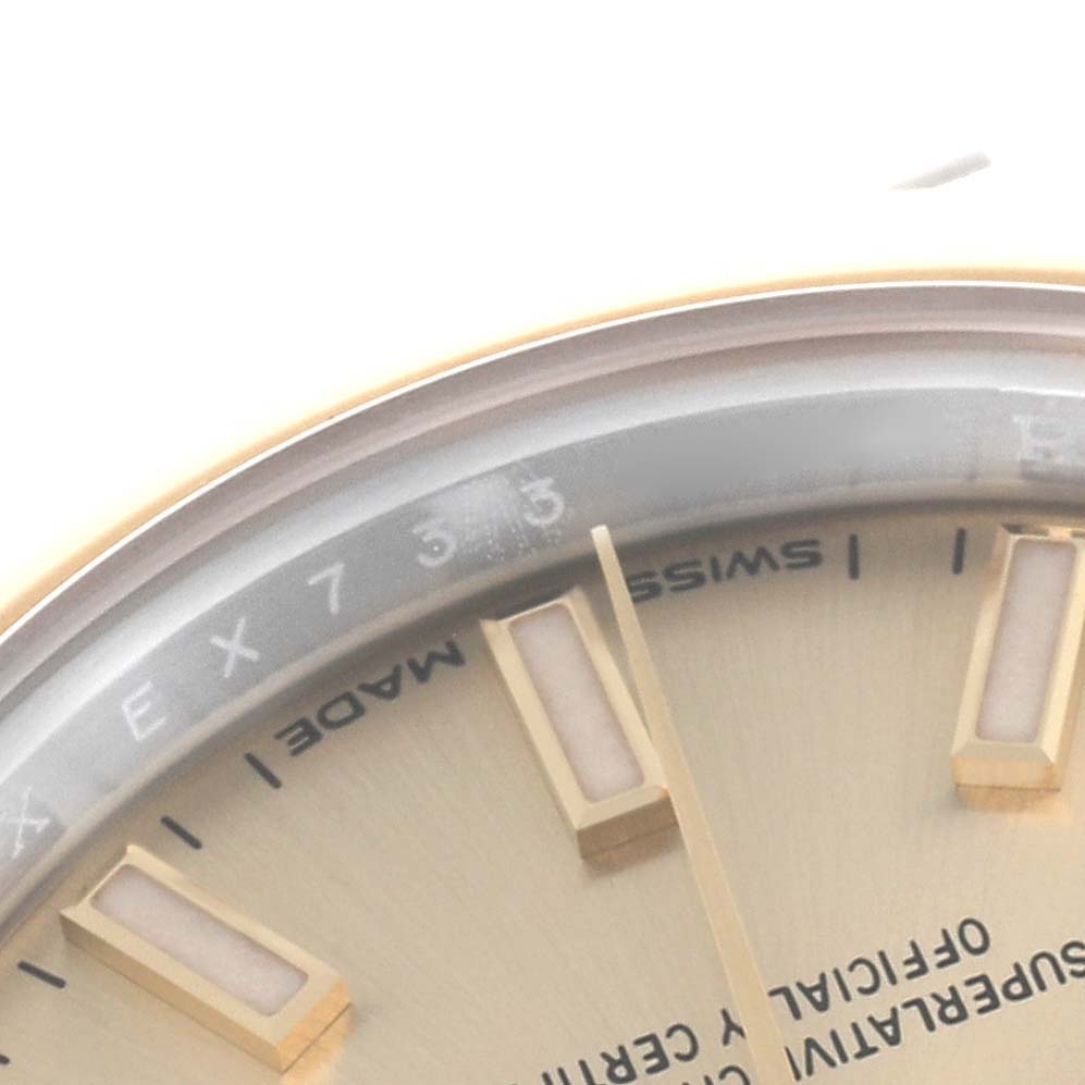 The image shows a close-up of the dial and hour markers on a Rolex Datejust 67166 Women's Steel and Gold (two tone) Champagne Dial 67166 Women's Steel and Gold (two tone) Champagne Dial.