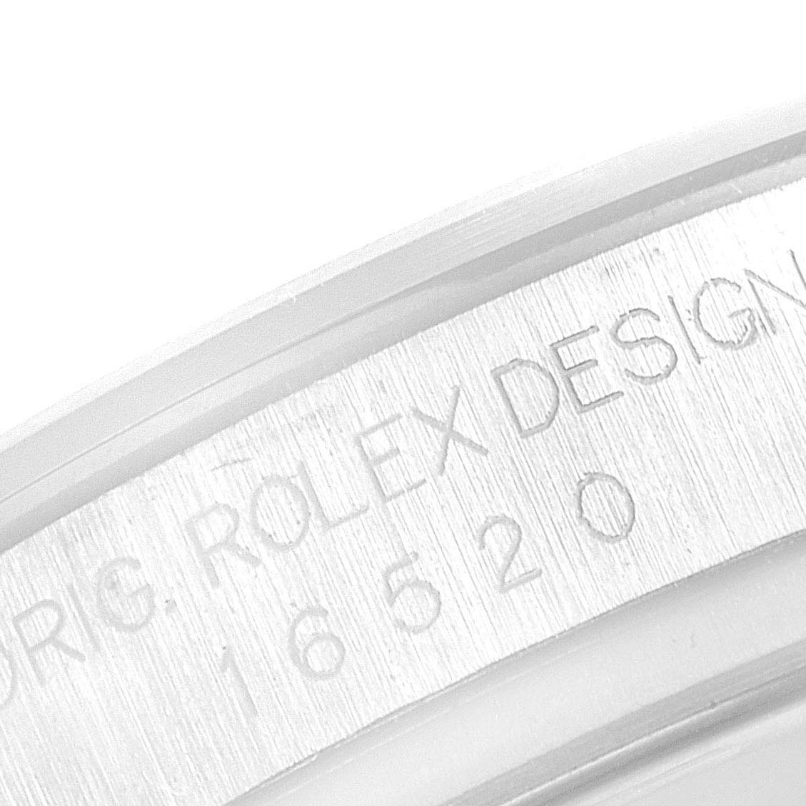 The image shows a close-up of the engraved inner bezel, also known as the rehaut, on a Rolex Daytona 16520 Men's Stainless Steel Black Dial 16520 Men's Stainless Steel Black Dial watch.