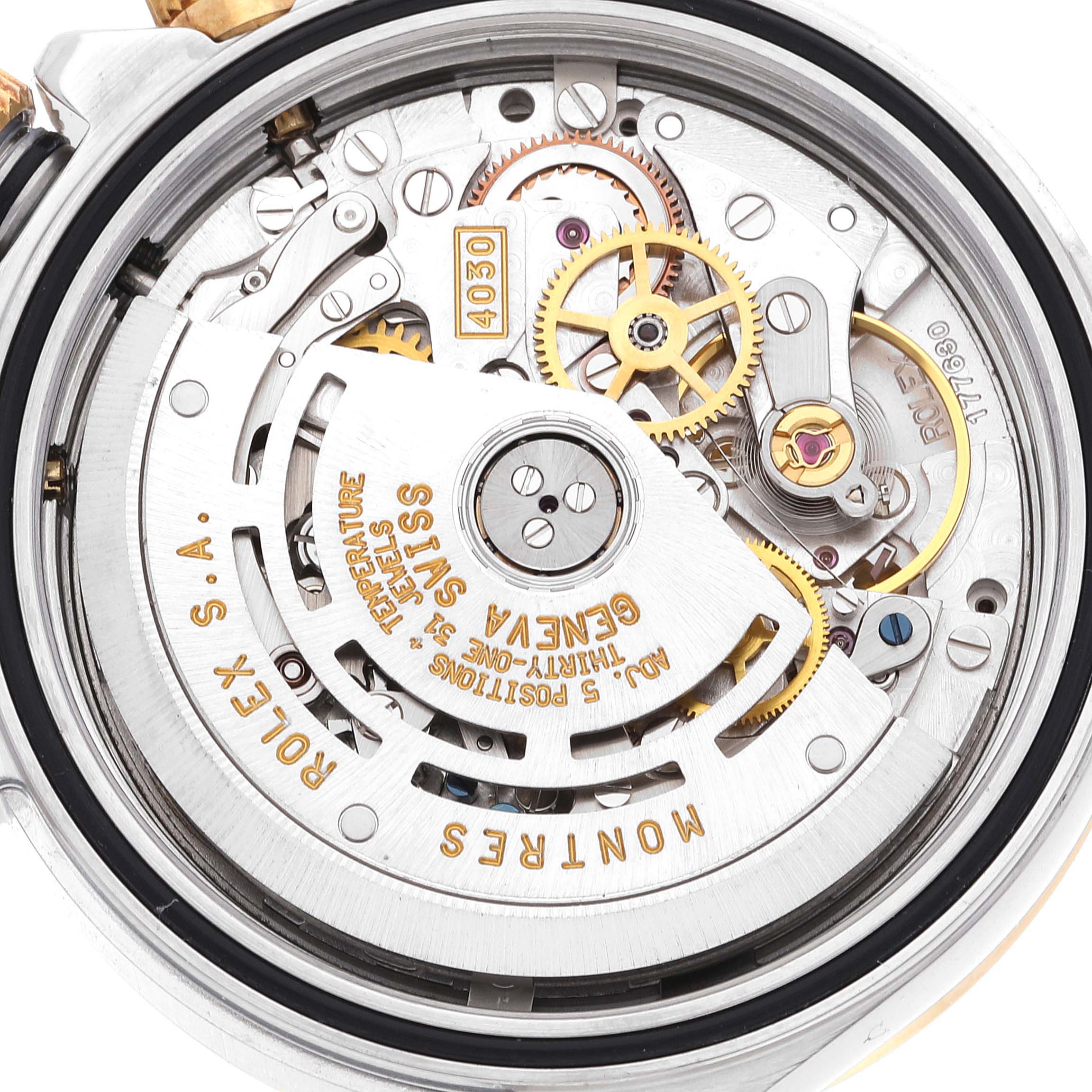 This image shows the back casing, revealing the intricate internal mechanism of the Rolex Daytona 16523 Men's Steel and Gold (two tone) White Dial 16523 Men's Steel and Gold (two tone) White Dial watch model.