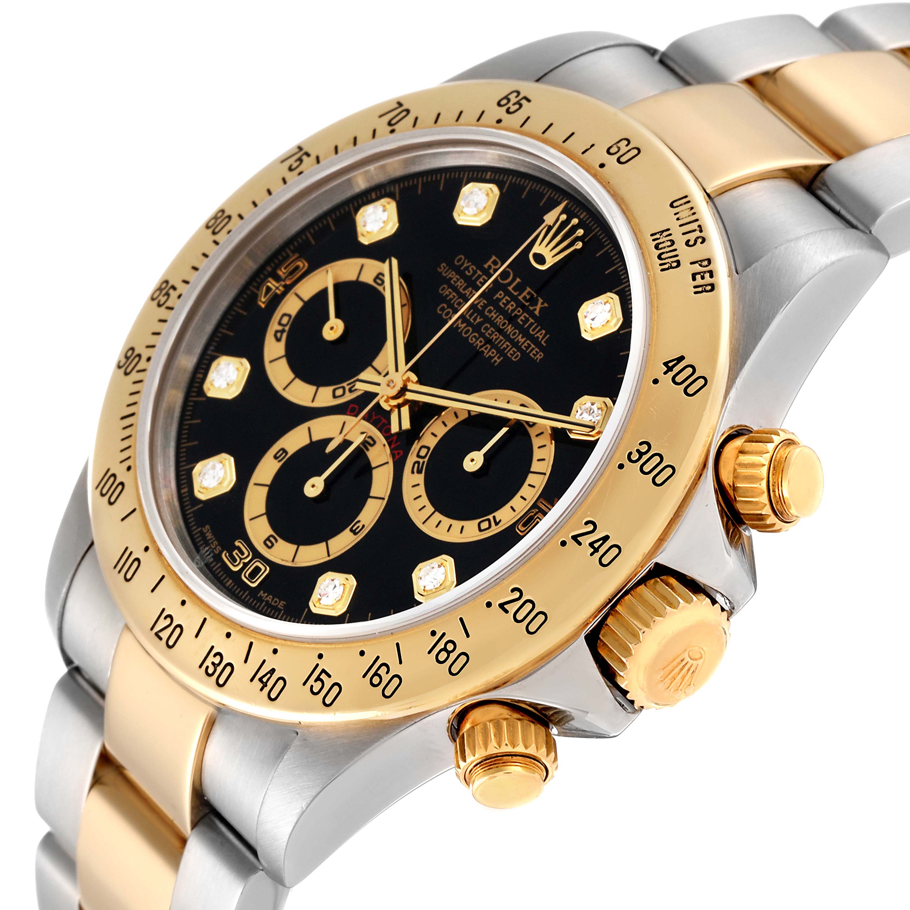 This image shows a Rolex Daytona 16523G Men
s Steel and Gold (two tone) Black Dial 16523G Men
s Steel and Gold (two tone) Black Dial watch at a slight angle, highlighting its bezel, dial, and partially the bracelet and crown.