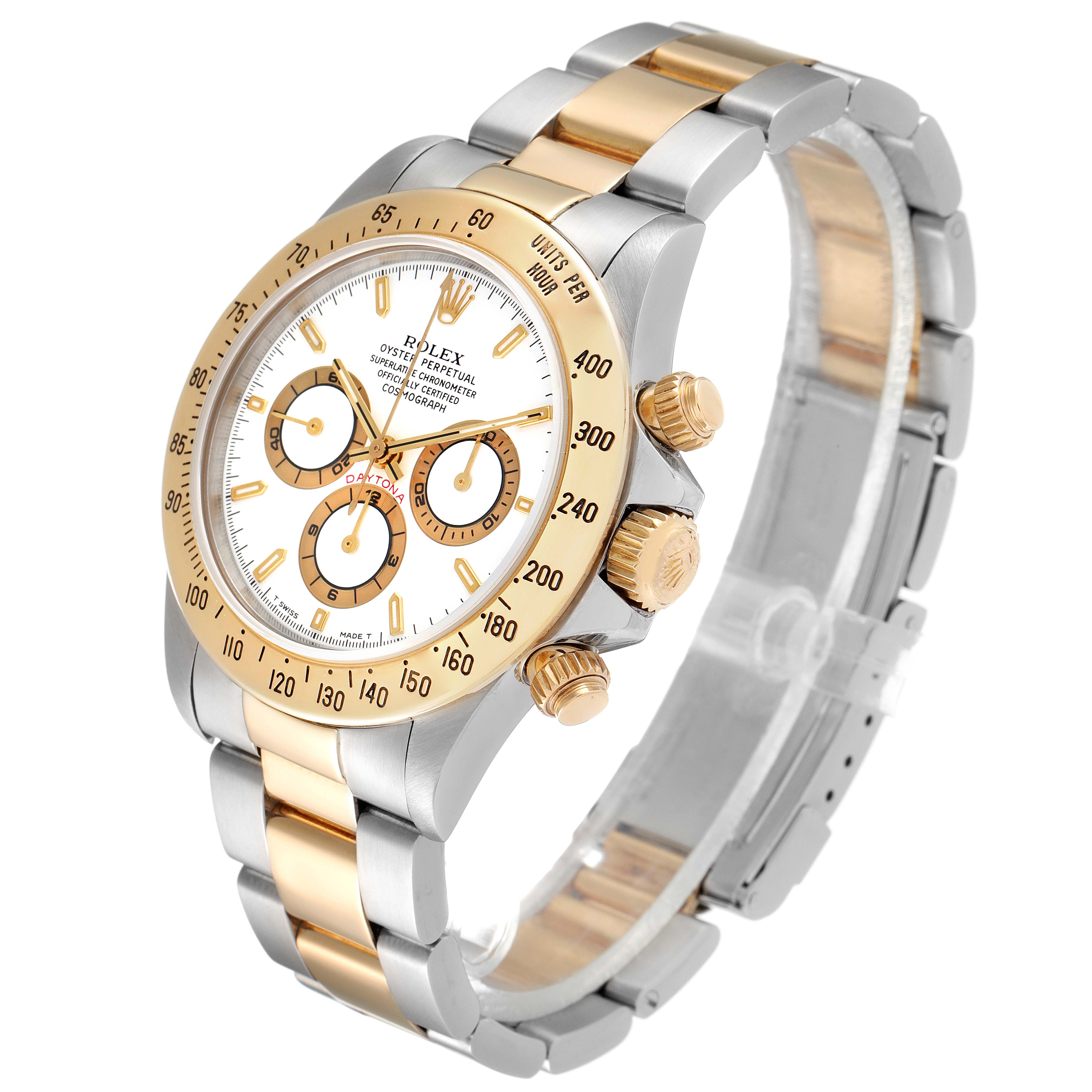 This image shows a Rolex Daytona 16523 Men
s Steel and Gold (two tone) White Dial 16523 Men
s Steel and Gold (two tone) White Dial watch from an angled side view, highlighting its bezel, dial, crown, and bracelet.