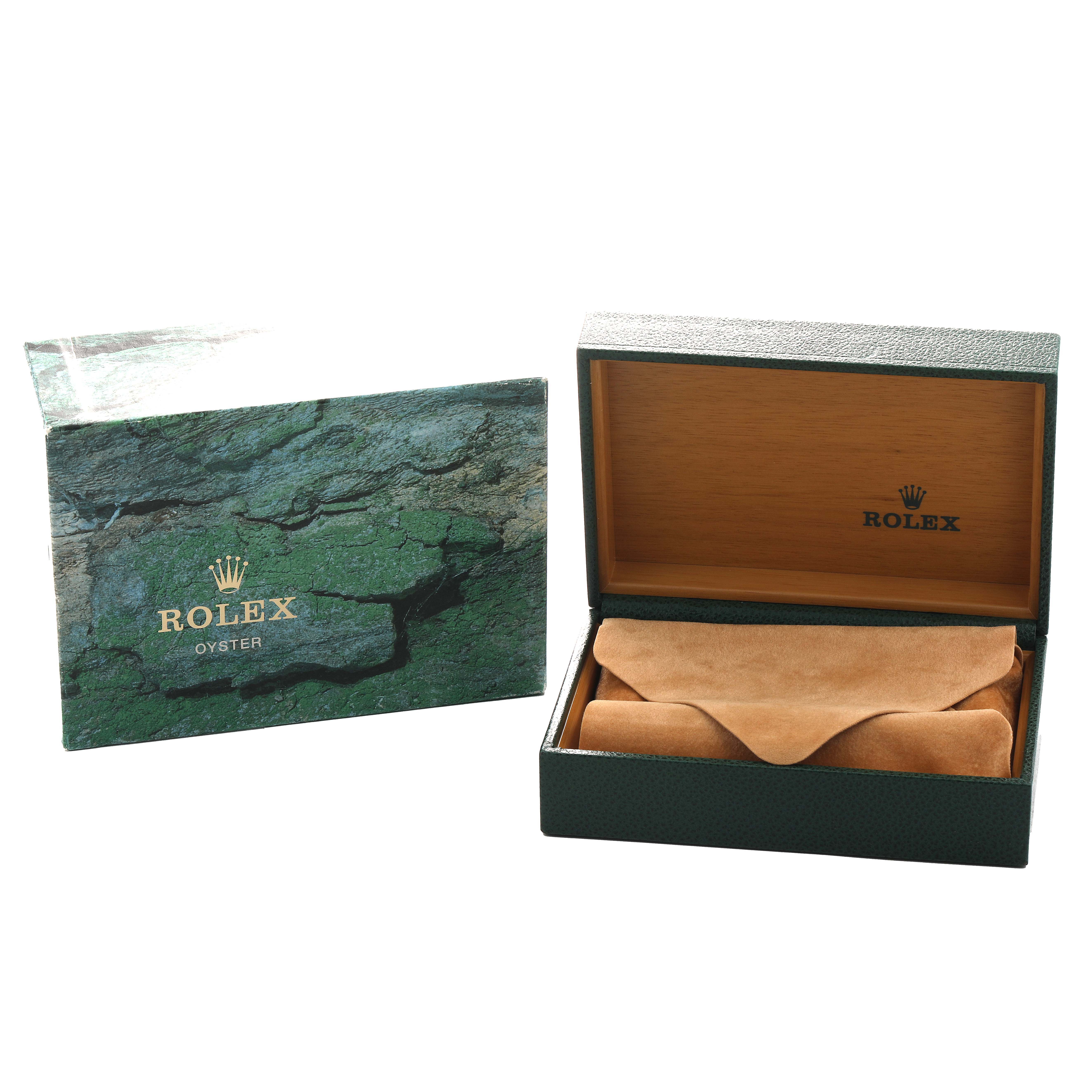 The image shows the open box and cover of a Rolex Explorer 16570 Men's Stainless Steel White Dial watch, highlighting the packaging.