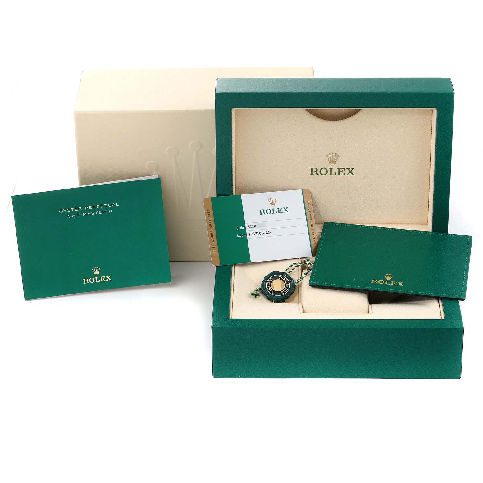 The image shows the packaging, warranty card, booklet, and accessories for a Rolex GMT-Master 126710 Men
s Stainless Steel Black Dial 126710 Men
s Stainless Steel Black Dial watch.