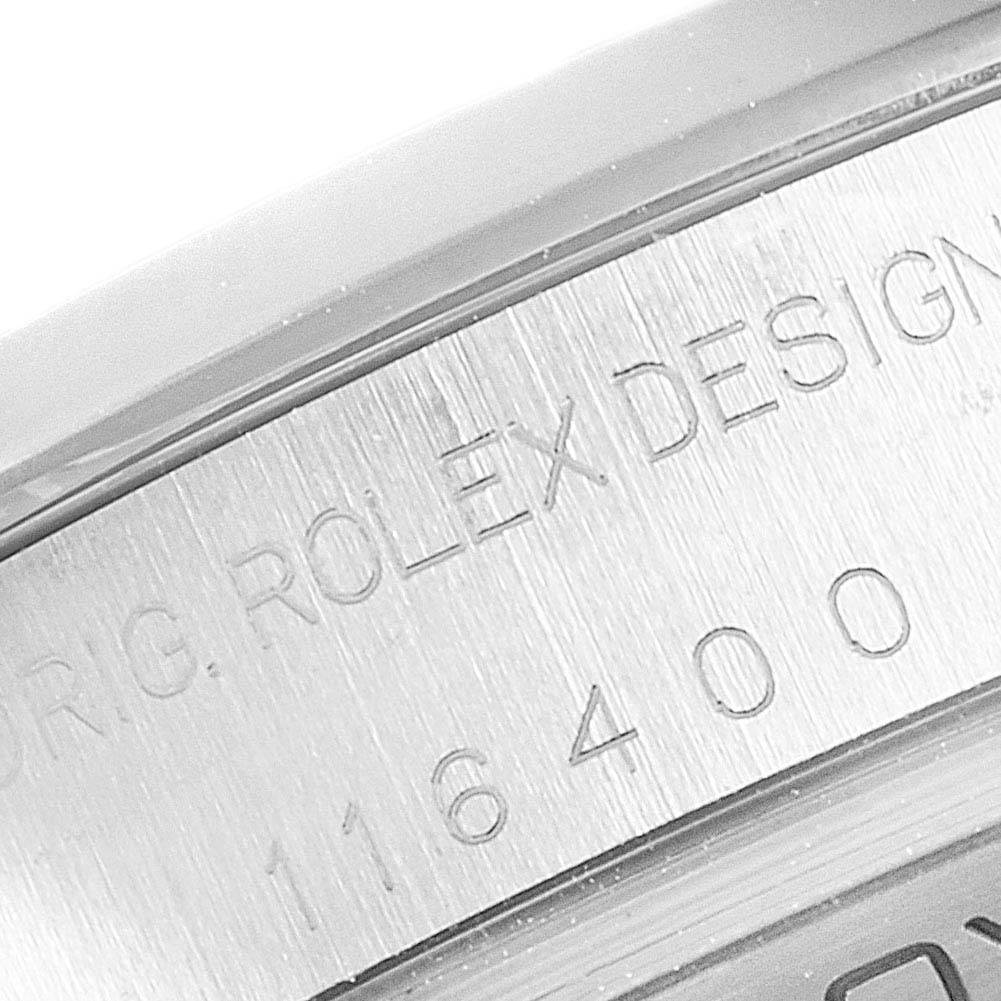 This close-up shows the engraved case back of the Rolex Milgauss 116400 Men
s Stainless Steel Black Dial 116400 Men
s Stainless Steel Black Dial model 116400.
