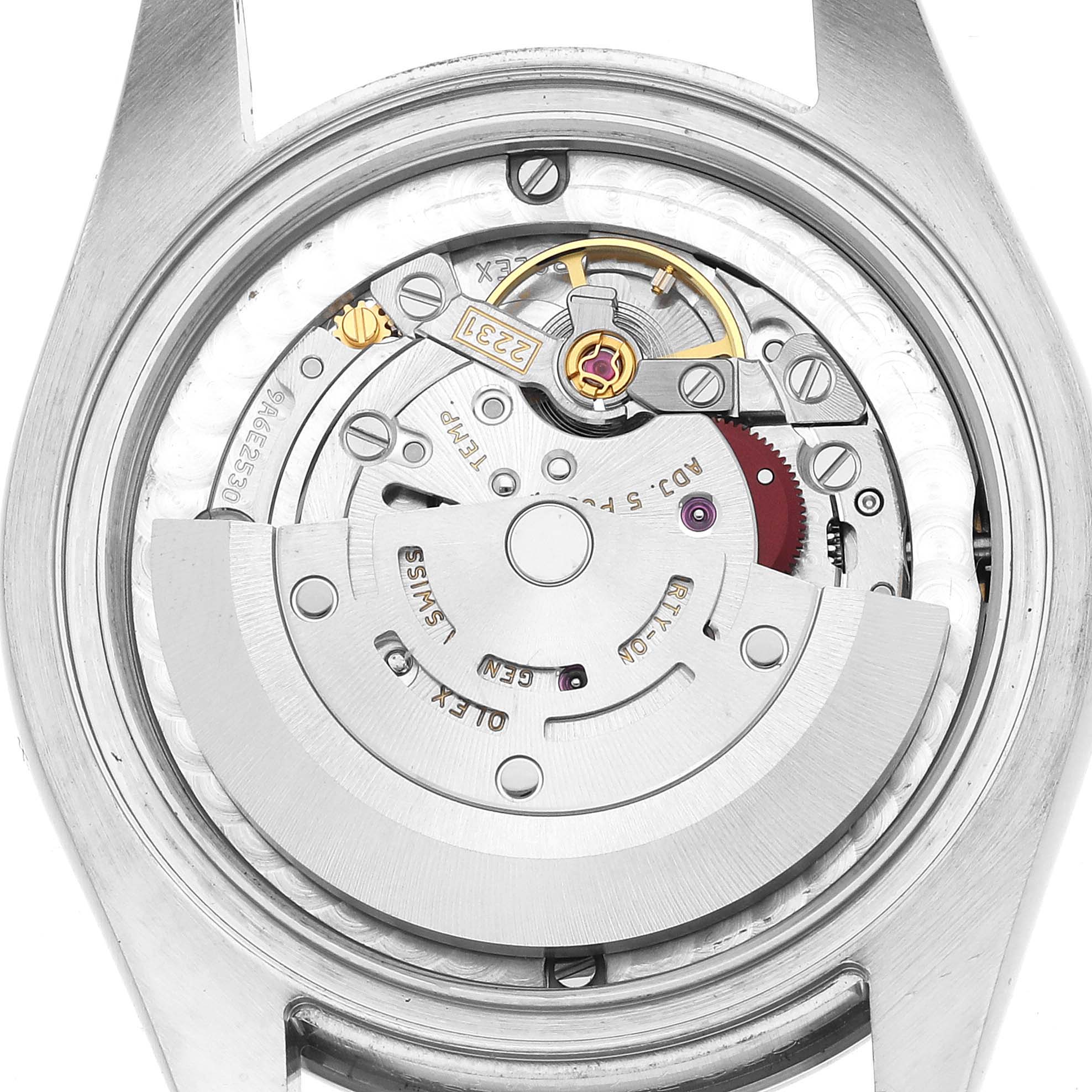 The image shows the back of a Rolex Oyster Perpetual 177200 Women's Stainless Steel Purple Dial, highlighting its intricate movement mechanism.