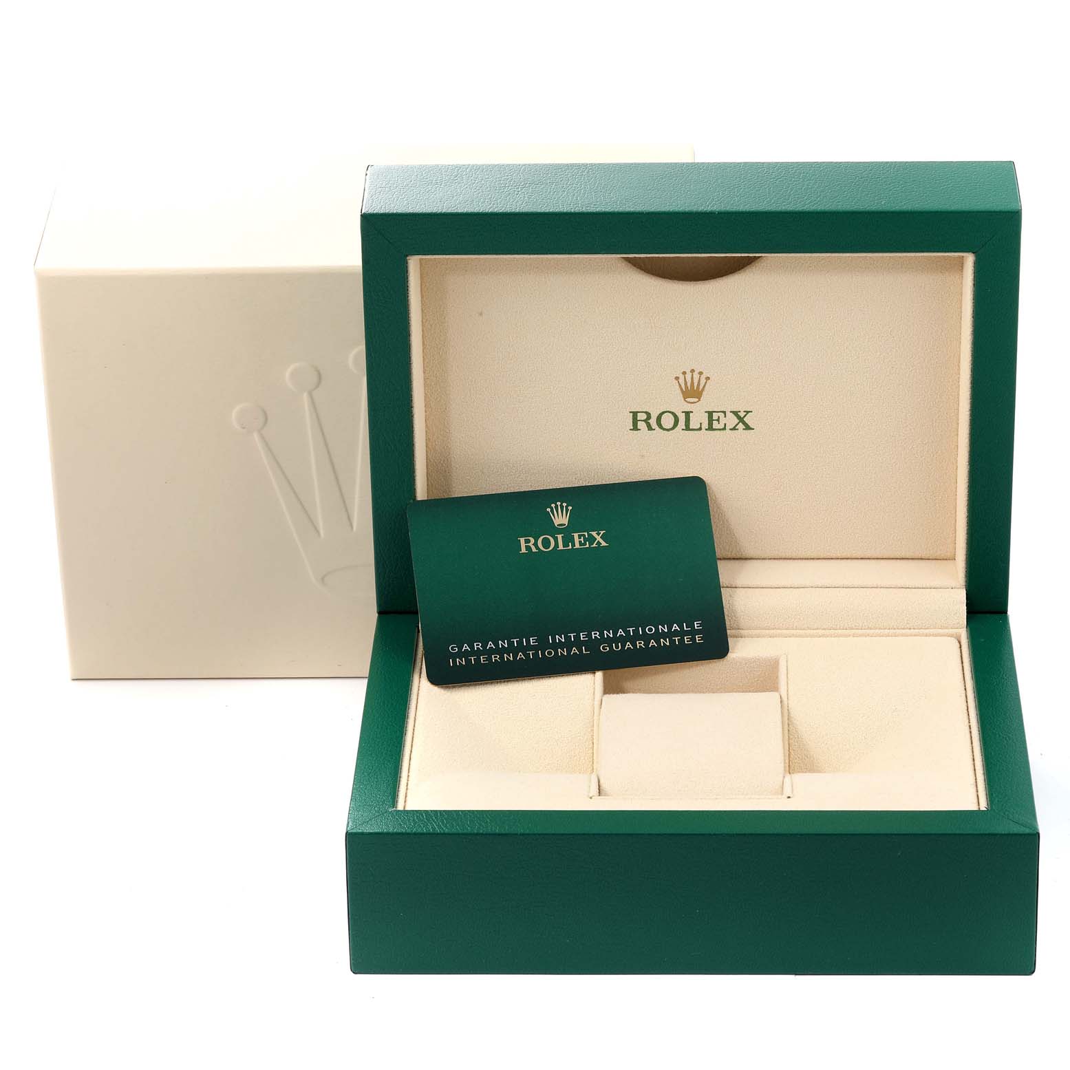 The image shows the open packaging of a Rolex Oyster Perpetual 124300 Men
s Stainless Steel Black Dial 124300 Men
s Stainless Steel Black Dial, including the green presentation box and the international guarantee card.