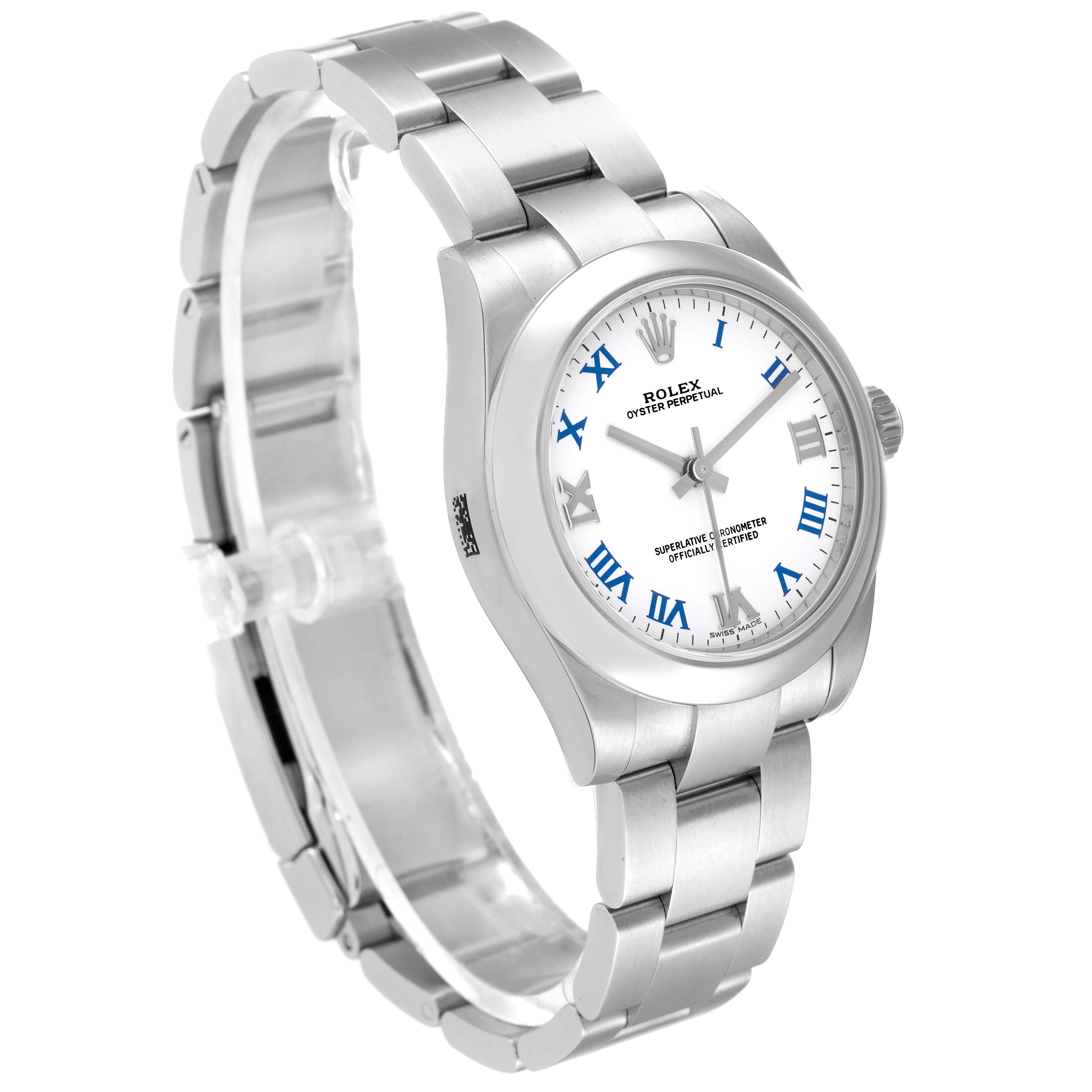 The image shows a silver Rolex Mid-Size 177200 Women
s Stainless Steel White Dial 177200 Women
s Stainless Steel White Dial Oyster Perpetual watch with a white dial and blue Roman numerals, viewed from a front-left angle.