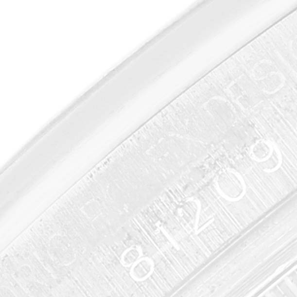 The image shows a close-up view of the case or bracelet of a Rolex Pearlmaster 81209 Women's White Gold Mother of Pearl Dial, highlighting engraved text and numbers.