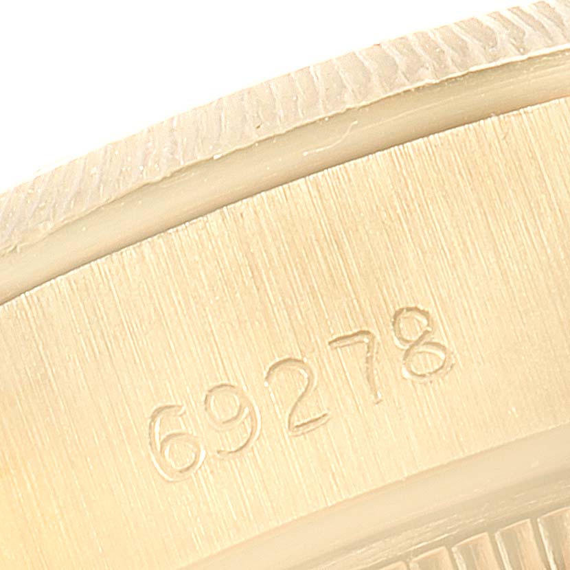 This close-up image shows the model number engraving (69278) on the side case of a Rolex President 69278 Women
s Yellow Gold White Dial 69278 Women
s Yellow Gold White Dial watch.
