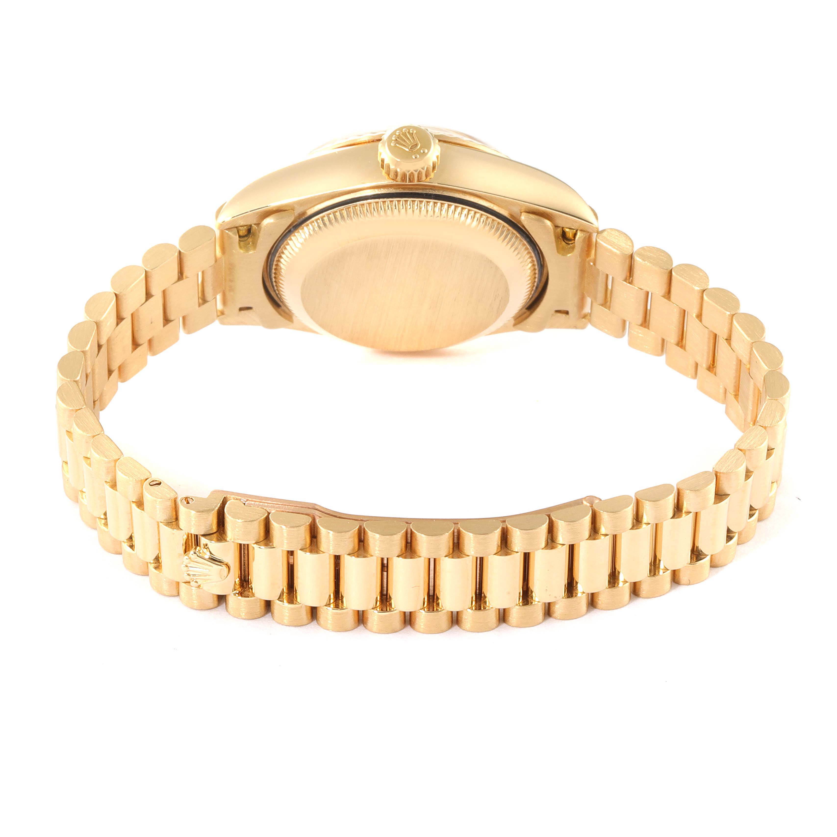 The image shows a Rolex President 79178 Women
s Yellow Gold Champagne Dial 79178 Women
s Yellow Gold Champagne Dial model watch from the back angle, featuring its case back and gold bracelet.