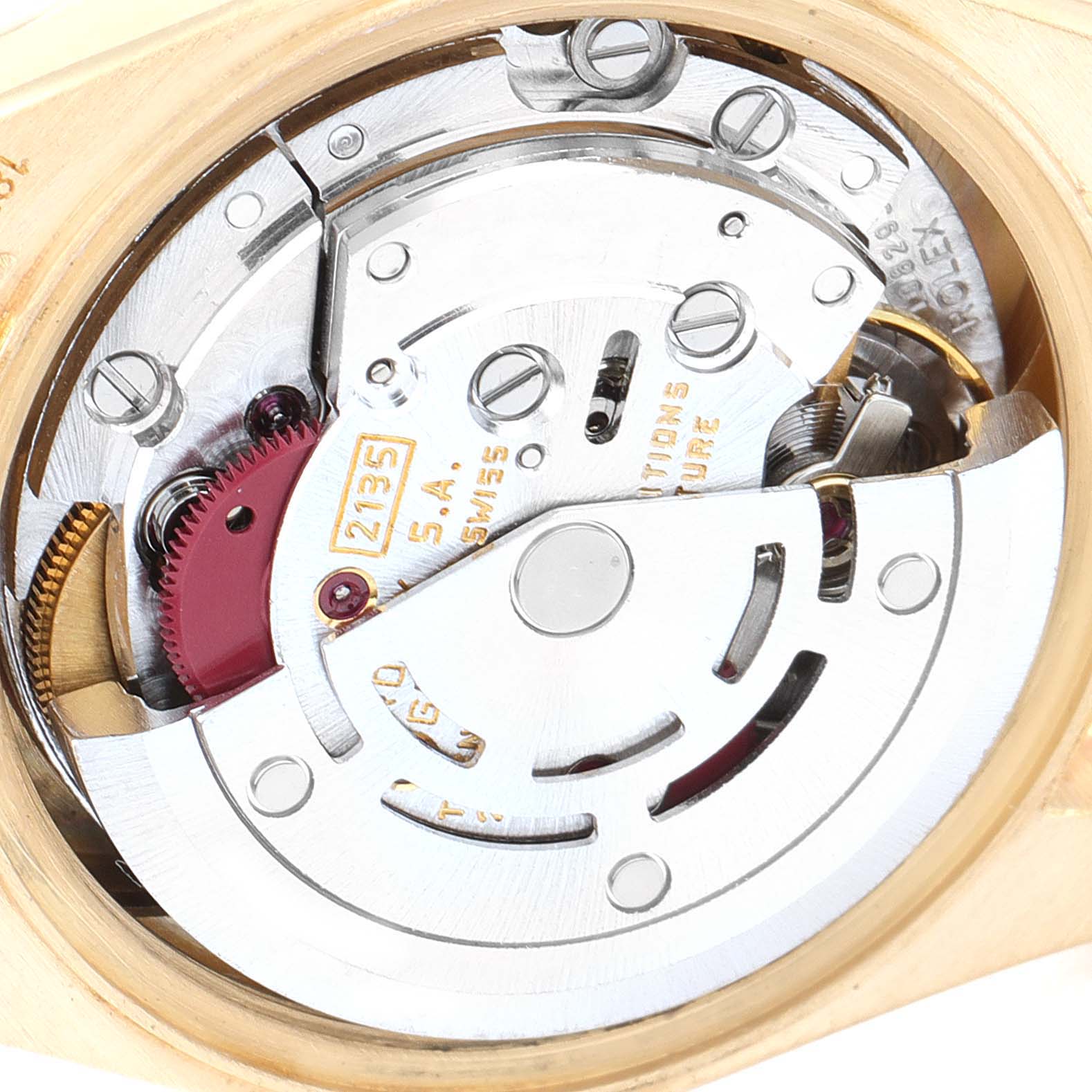 This image shows the intricate internal mechanism of a Rolex President 69178 Women
s Yellow Gold Champagne Dial 69178 Women
s Yellow Gold Champagne Dial model watch from a rear angle with the caseback removed.