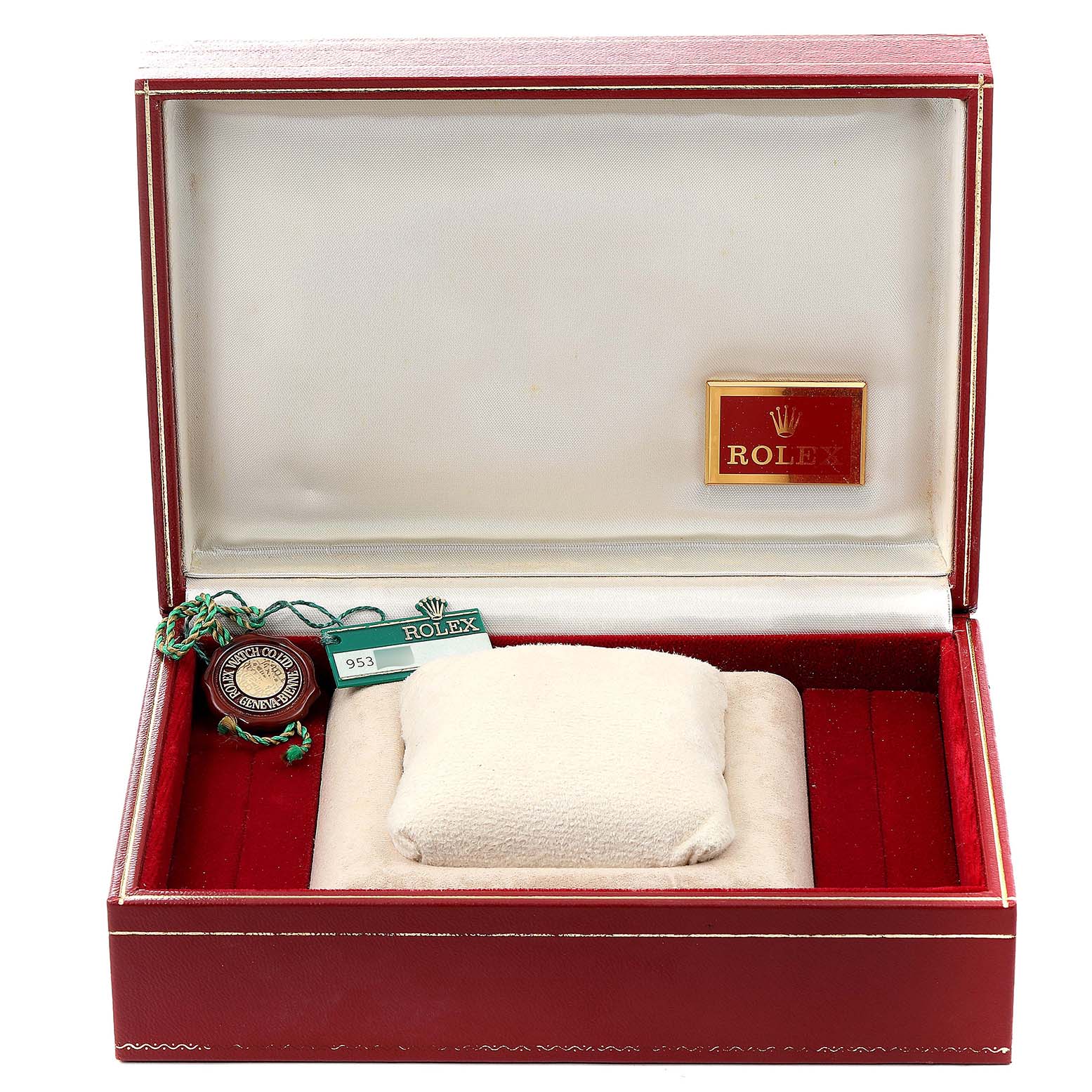 This image shows an open Rolex President 69138 Women
s Yellow Gold Champagne Dial 69138 Women
s Yellow Gold Champagne Dial model watch box, displaying its interior compartments and tags.