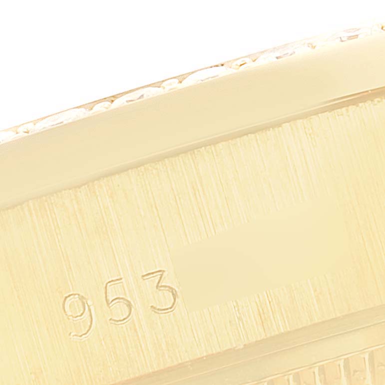 This image shows a close-up of the President model by Rolex, highlighting the serial number engraved on the watch case.